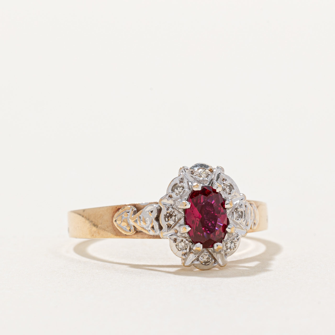 Synthetic Ruby & Diamond Halo Ring | 0.45ct, 0.04ctw | SZ 7.75 |