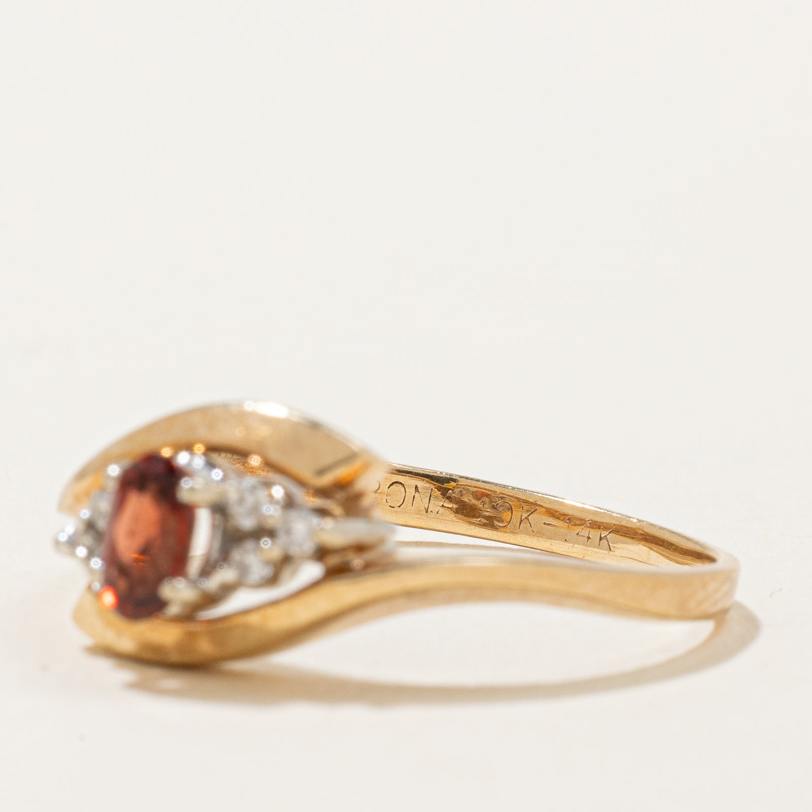 Garnet & Diamond Ring | 0.25ct, 0.04ctw | SZ 7.75 |