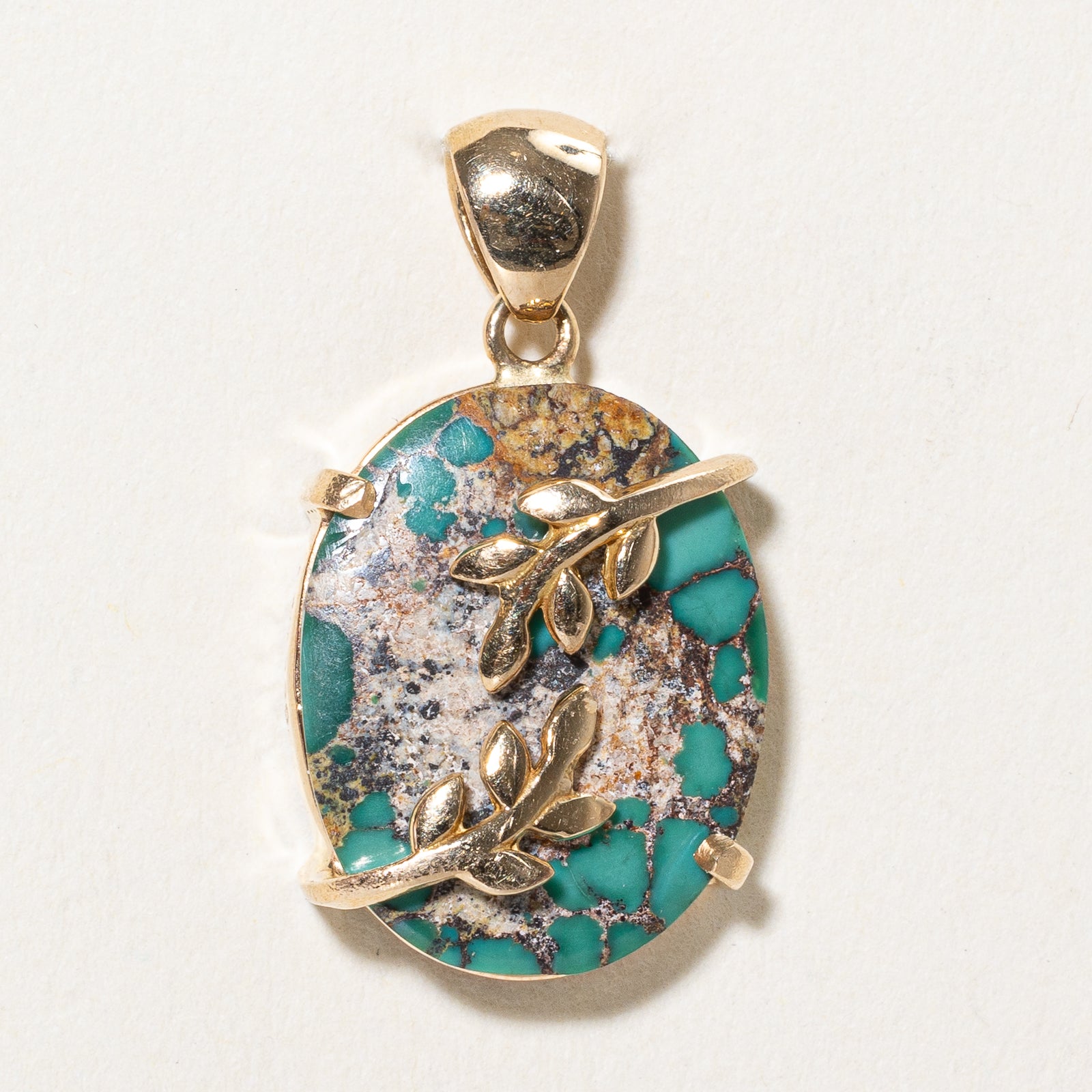 Oval Turquoise Leaf Design Pendant | 12.00ct