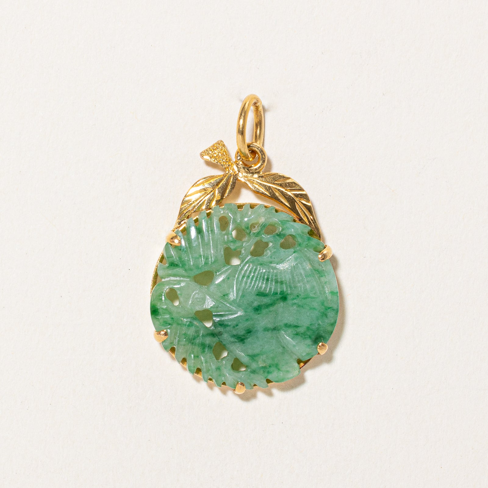 Carved Jadeite Circle Pendant | 12.00ct
