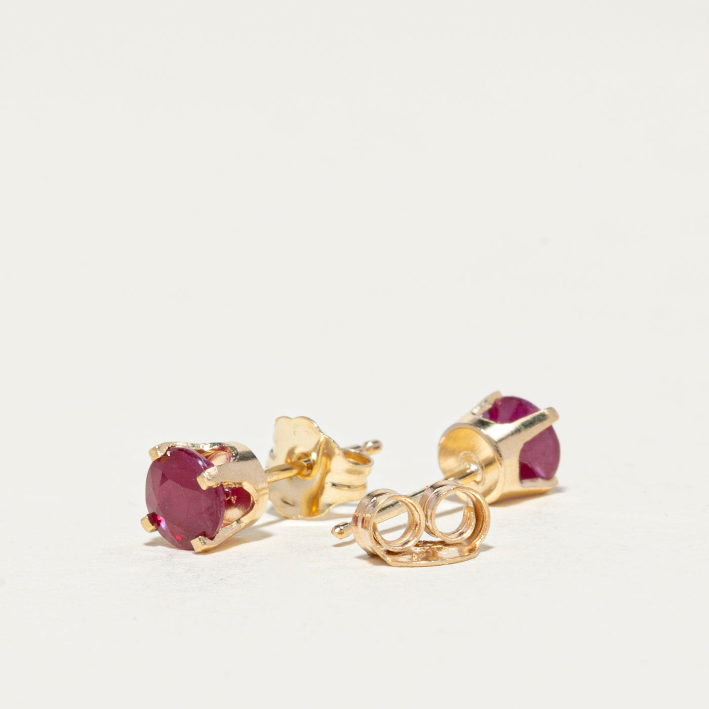 14K Round Cut Ruby Stud Earrings | 0.64ctw