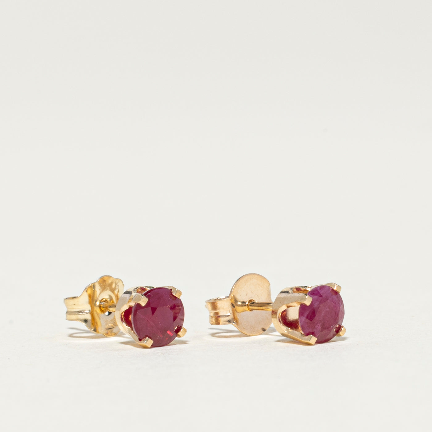 14K Round Cut Ruby Stud Earrings | 0.64ctw