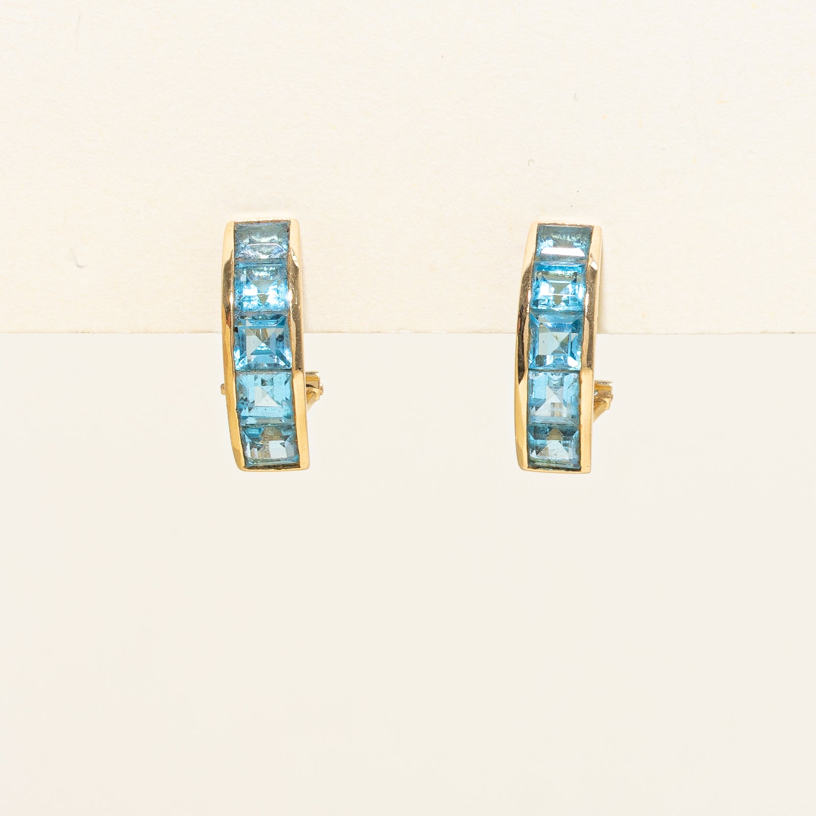 Channel Set Blue Topaz Huggie Earrings | 4.00ctw