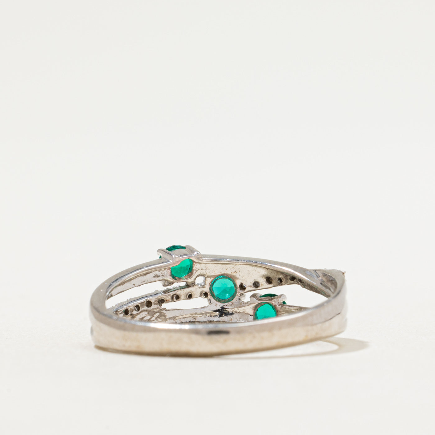 Synthetic Emerald & Diamond Crossover Ring | 0.30ctw, 0.04ctw | SZ 7.25
