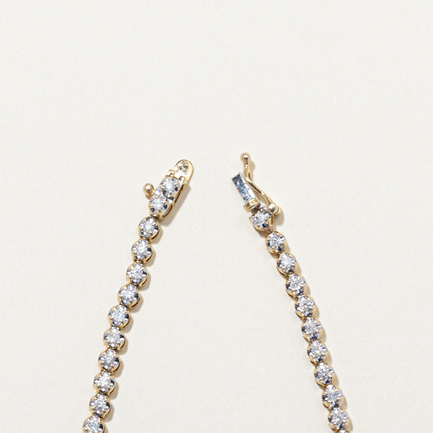 10K Illusion Set Diamond Tennis Bracelet | 1.10ctw | 7.5"