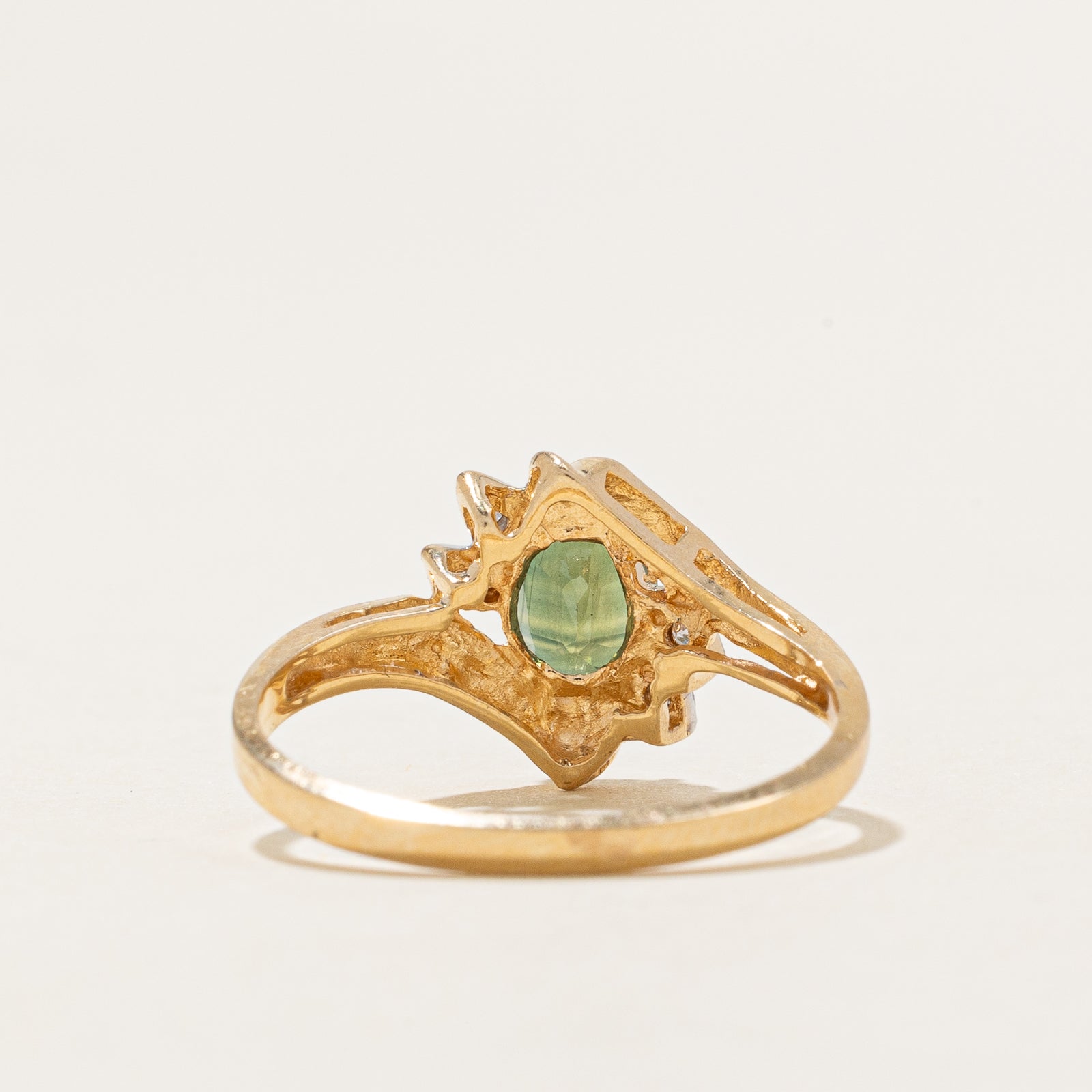 Bague sertie d'un saphir vert et de diamants (0,90 ct, 0,03 ct) | Taille 7
