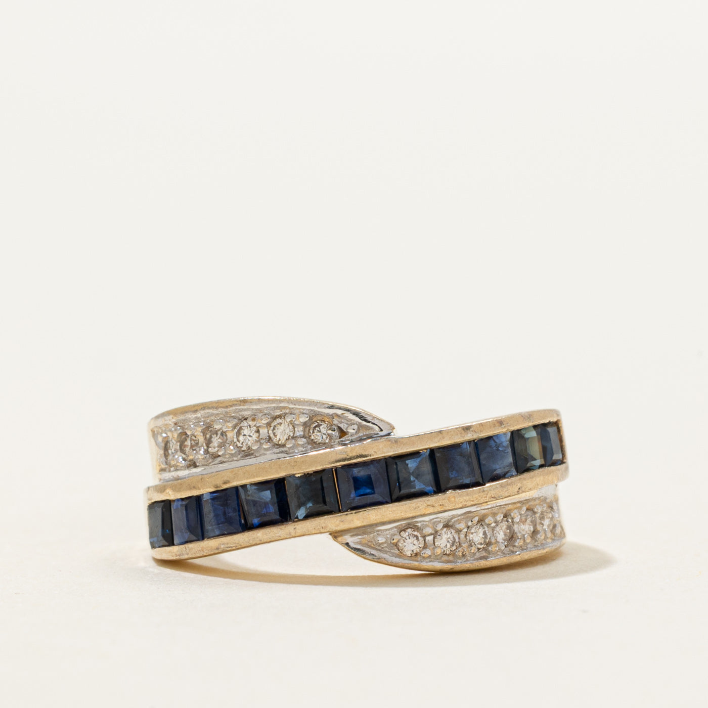 Channel Set Sapphire & Diamond Cross Over Ring | 0.80ctw, 0.12ctw | SZ 5.5