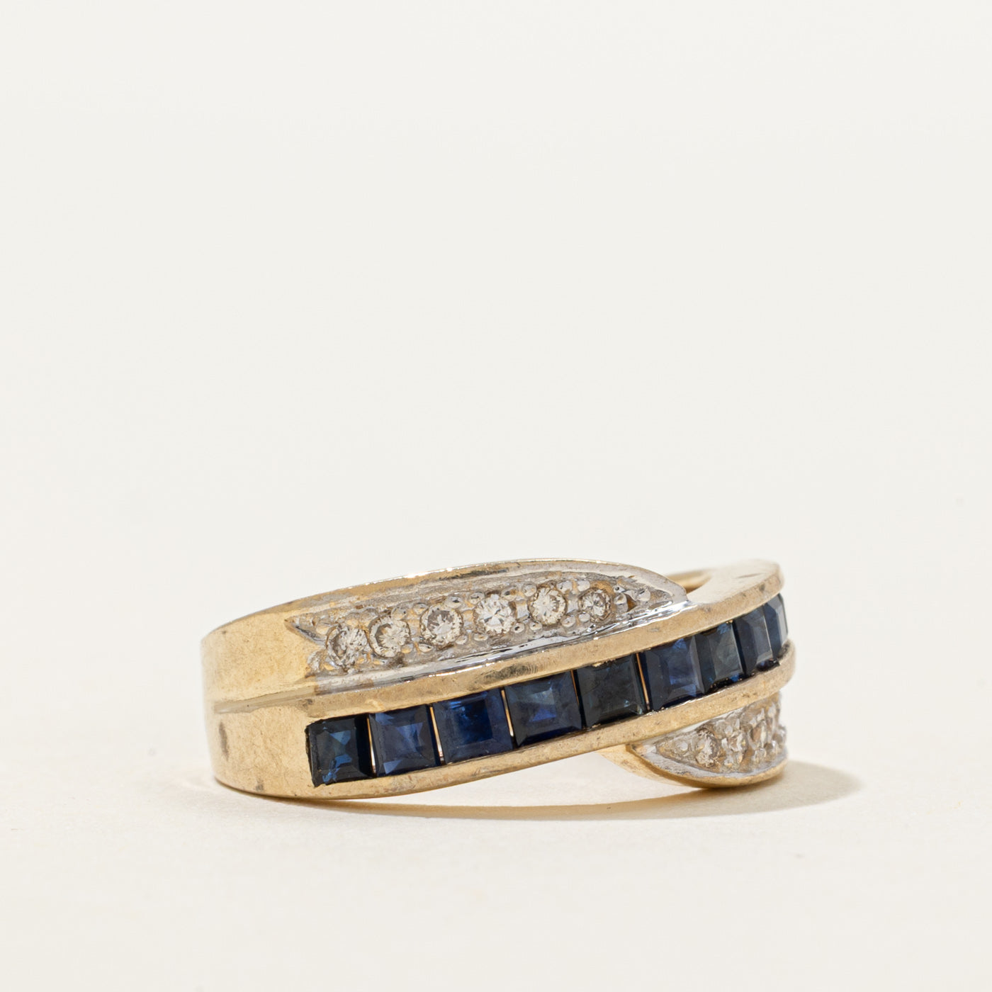 Channel Set Sapphire & Diamond Cross Over Ring | 0.80ctw, 0.12ctw | SZ 5.5