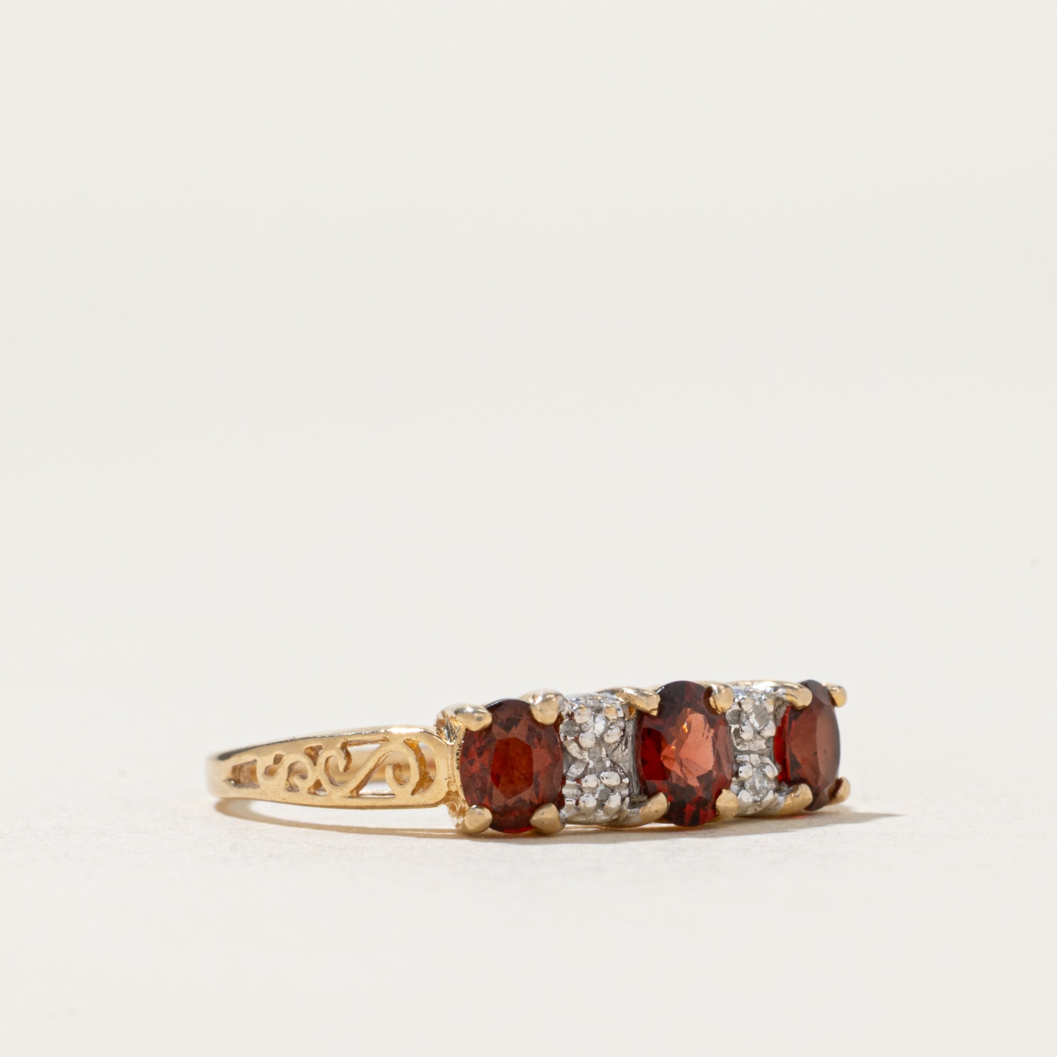 Three Stone Garnet & Diamond Ring | 0.78ctw, 0.02ctw | SZ 5.5