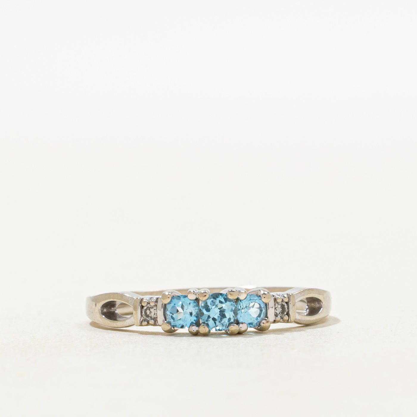 Three Stone Blue Topaz & Diamond Openwork Ring | 0.20ctw, 0.02ctw | SZ 6.5