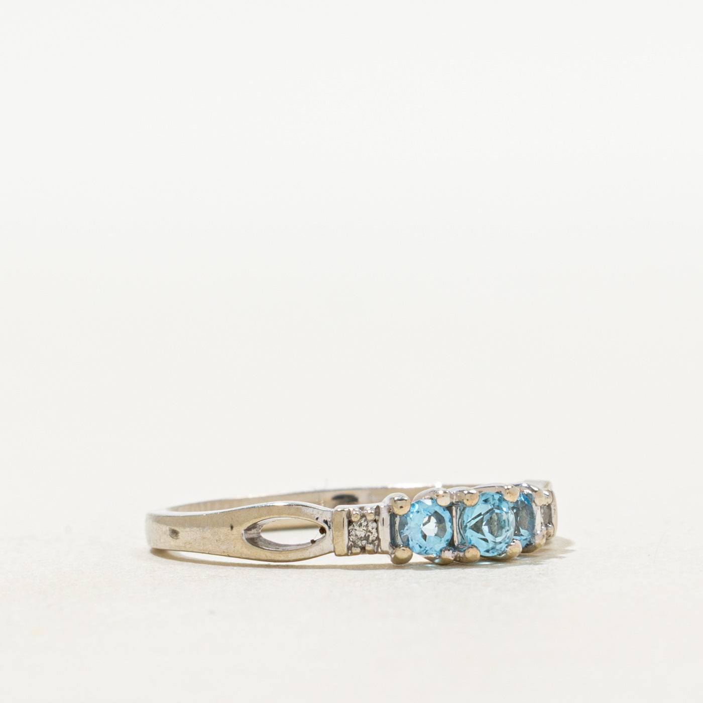Three Stone Blue Topaz & Diamond Openwork Ring | 0.20ctw, 0.02ctw | SZ 6.5