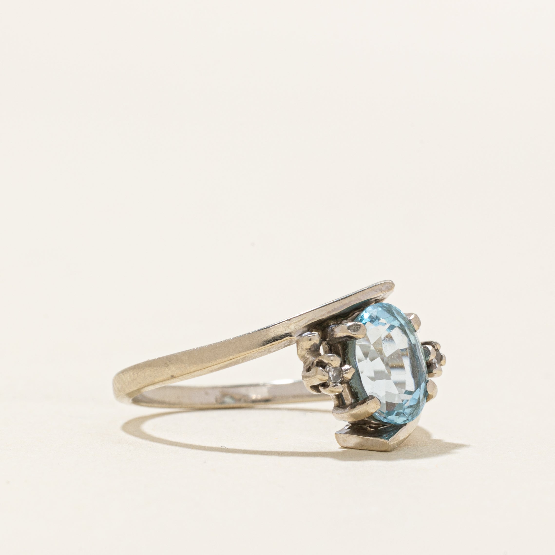 Oval Cut Blue Topaz & Diamond Bypass Ring | 1.73ct, 0.02ctw | SZ 6
