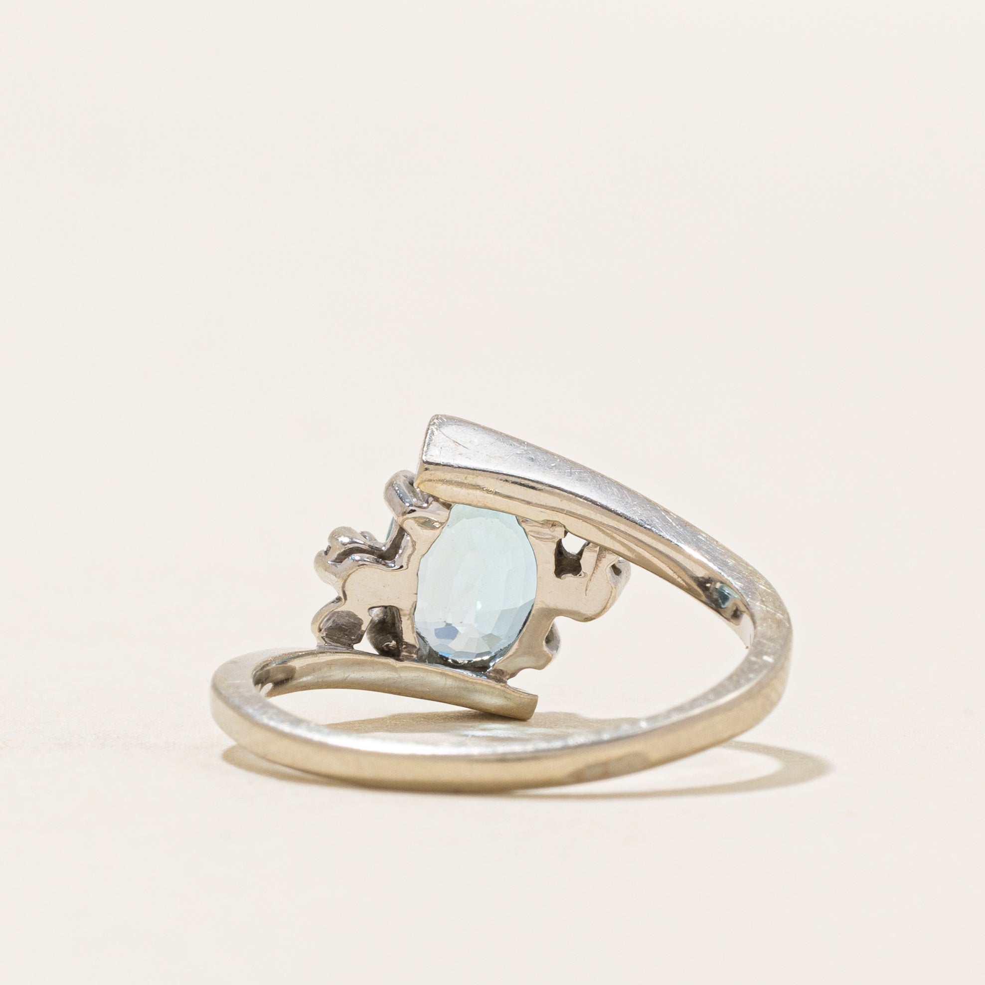 Oval Cut Blue Topaz & Diamond Bypass Ring | 1.73ct, 0.02ctw | SZ 6