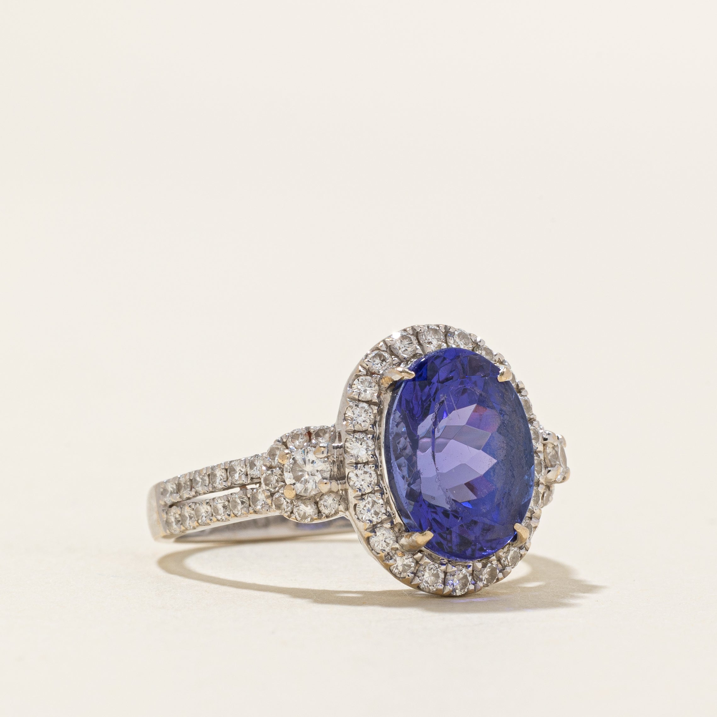 18k Oval Cut Tanzanite & Diamond Halo Ring | 3.93ct, 0.77ctw | SZ 7