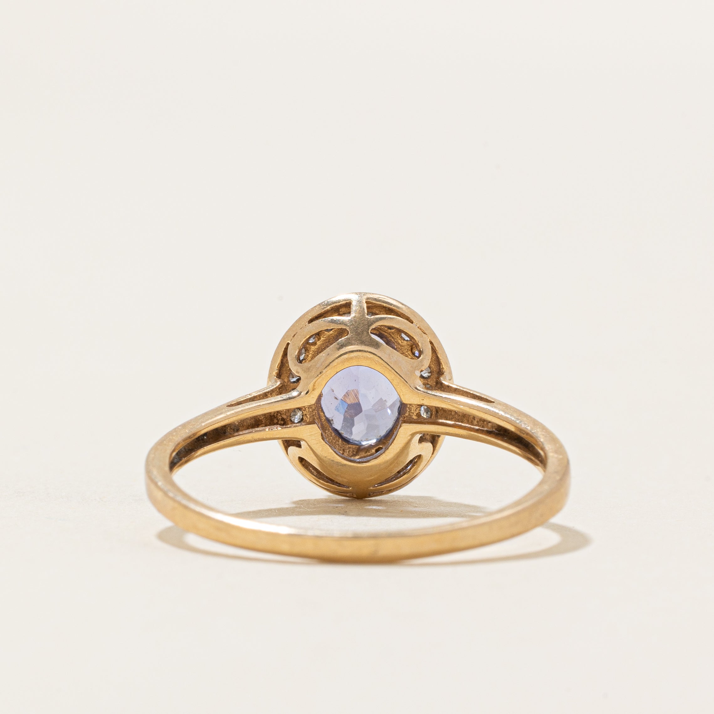 Oval Cut Tanzanite & Diamond Halo Ring | 0.95ct, 0.11ctw | SZ 9.25