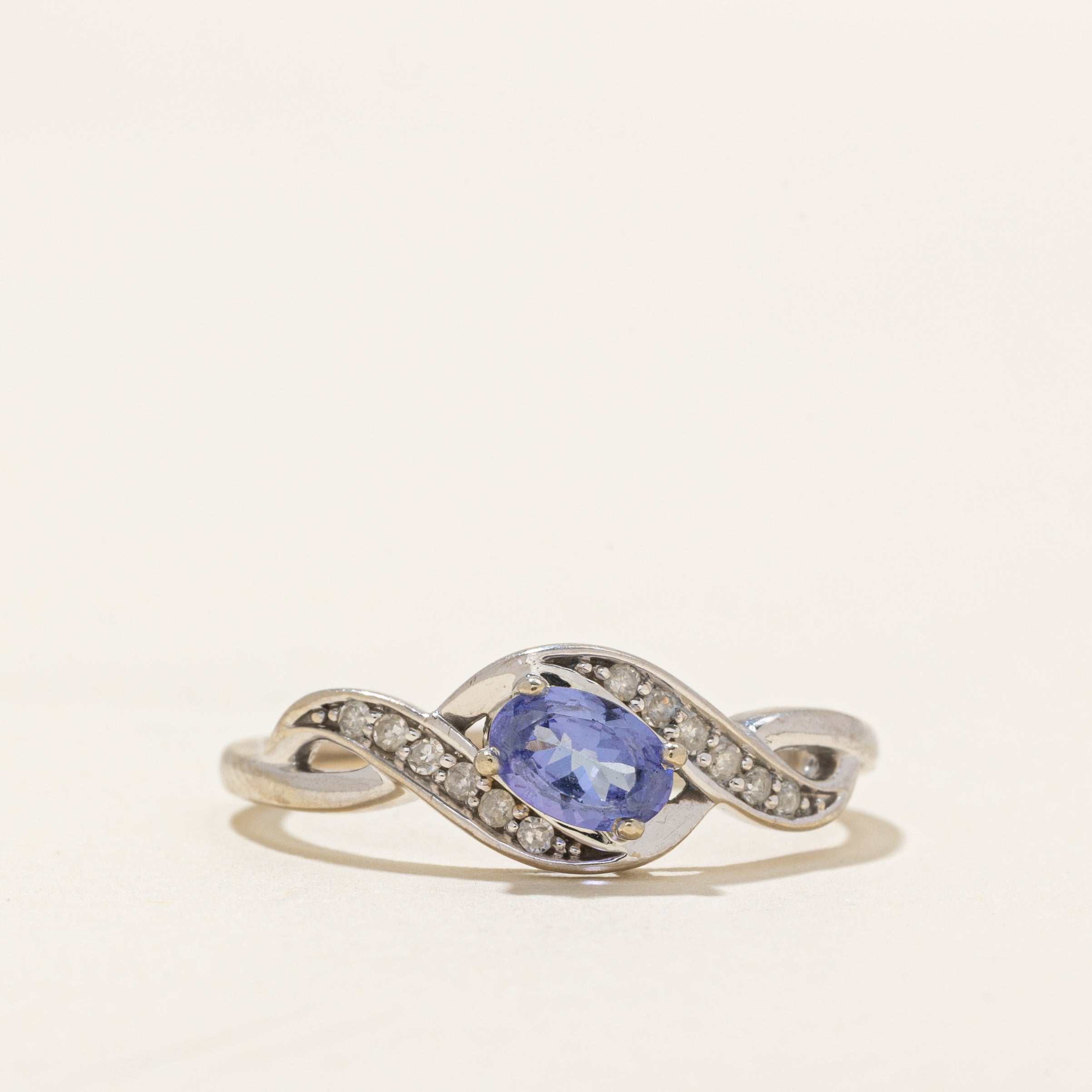 Oval Cut Tanzanite & Diamond Cross Over Ring | 0.41ct, 0.06ct | SZ 8