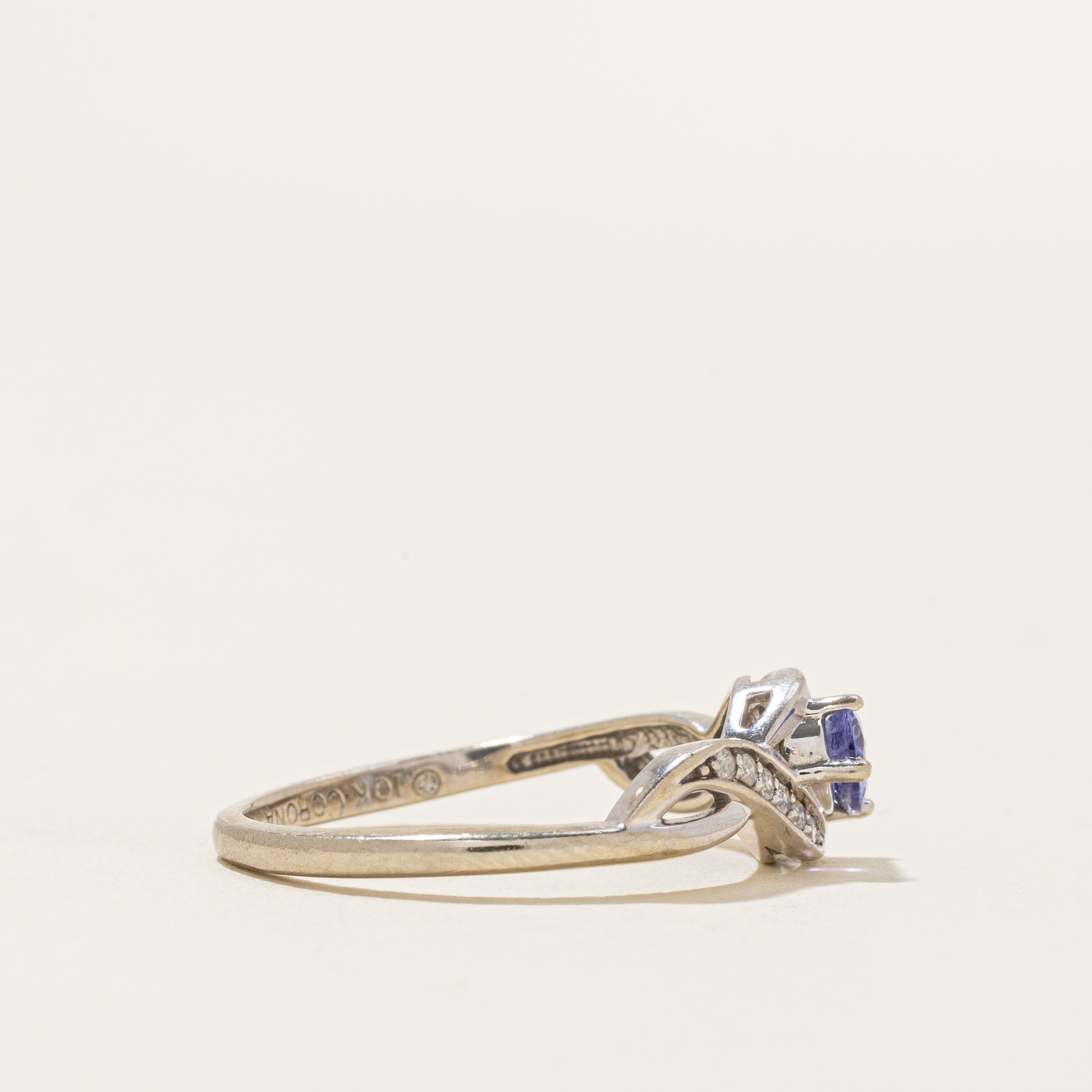 Oval Cut Tanzanite & Diamond Cross Over Ring | 0.41ct, 0.06ct | SZ 8