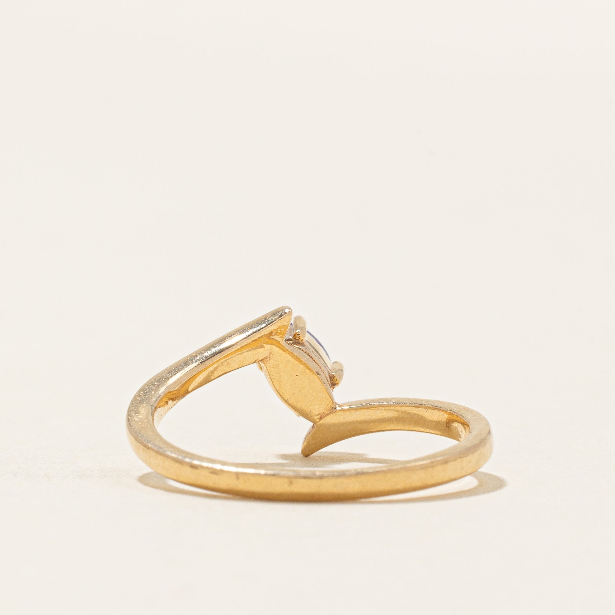 Oval Cut Tanzanite Bypass Ring | 0.22ct | SZ 7.75