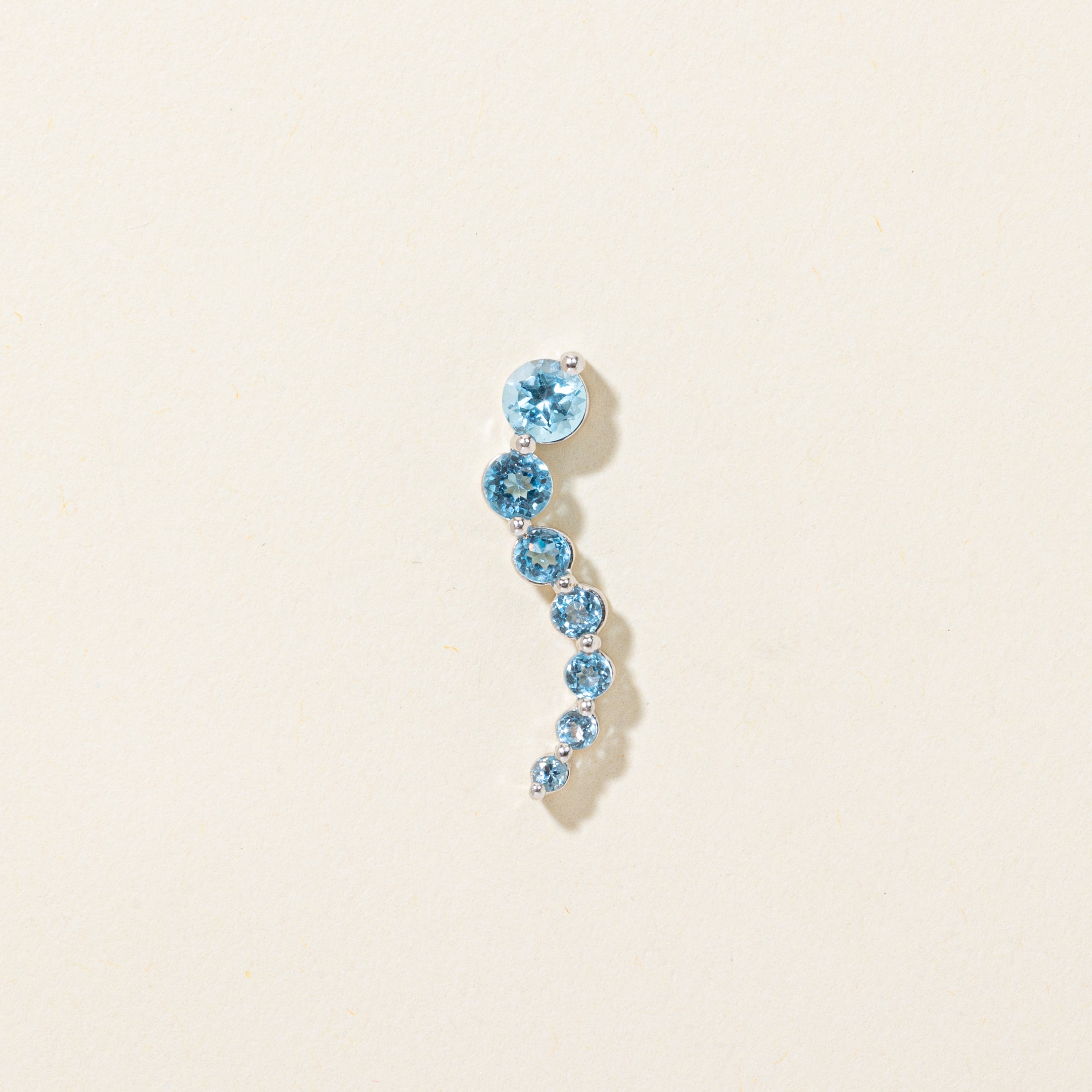 White Gold Blue Topaz Journey Pendant | 0.60ctw