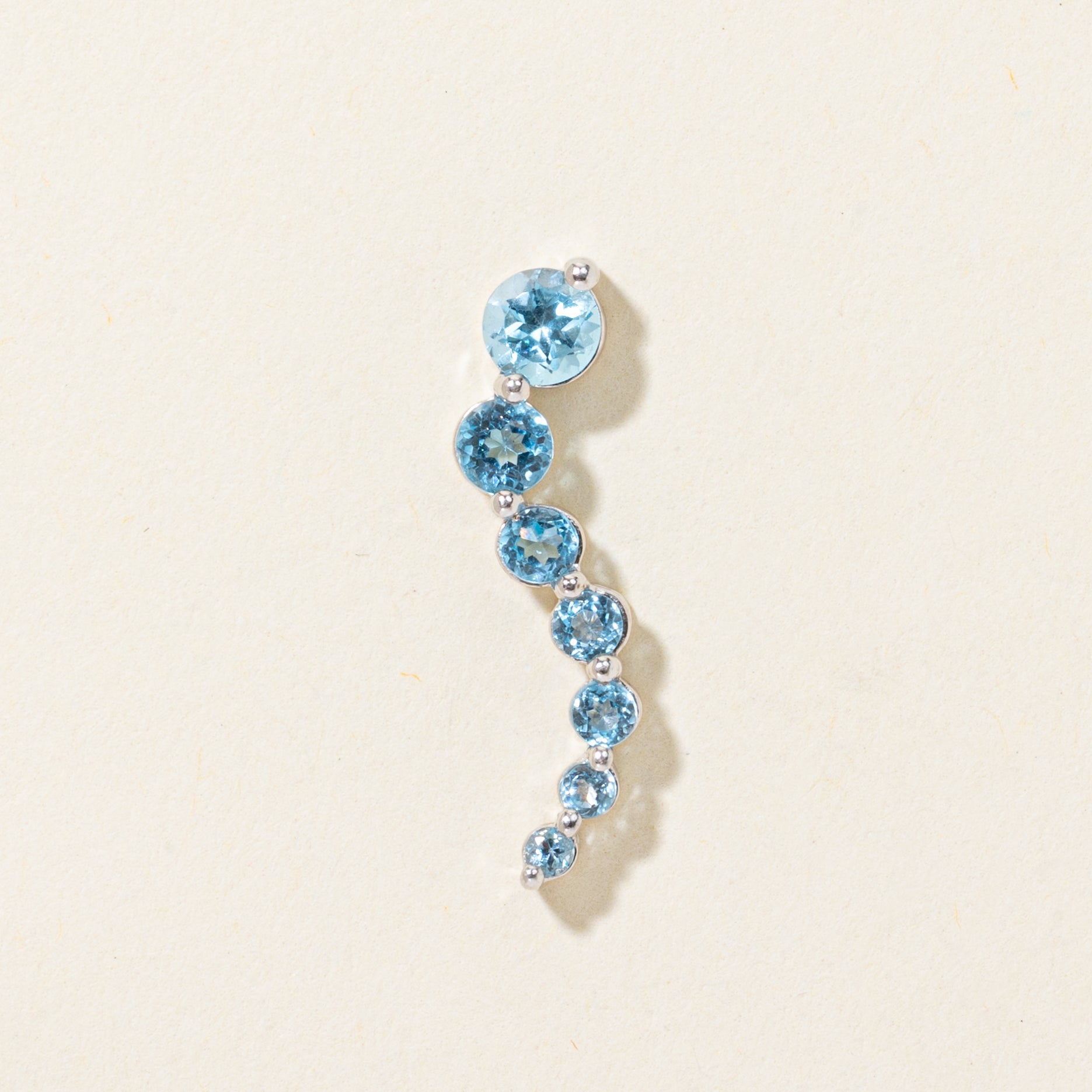 White Gold Blue Topaz Journey Pendant | 0.60ctw