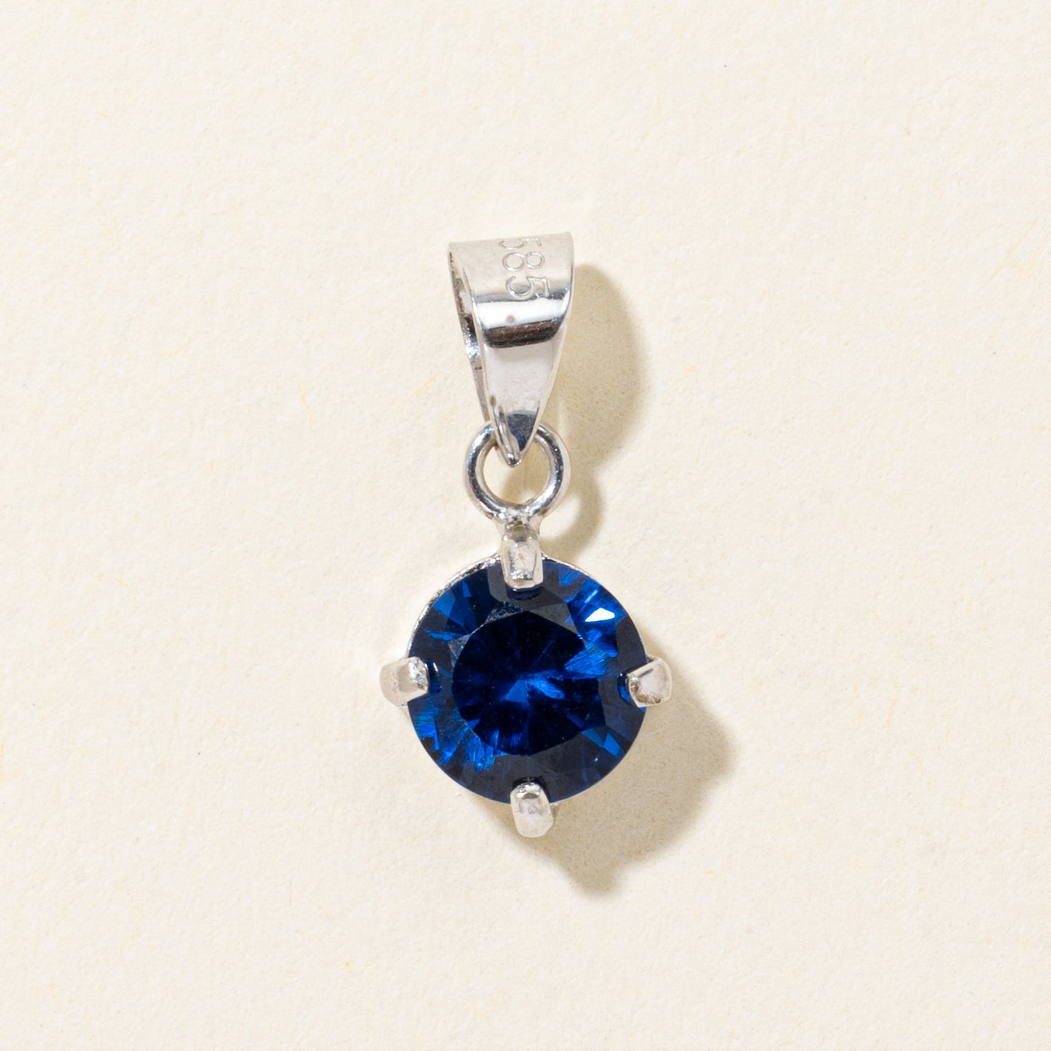 Basket Set Synthetic Sapphire Pendant | 0.72ct