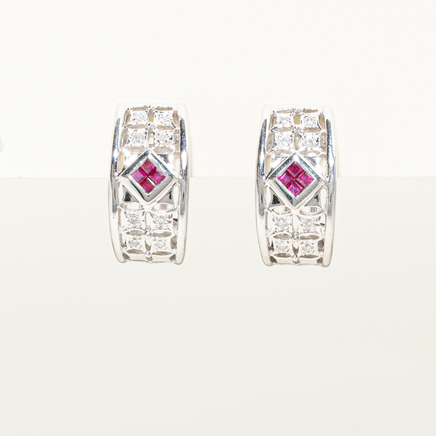 Illusion Set Diamond & Ruby Omega Earrings | 0.14ct, 0.50ctw