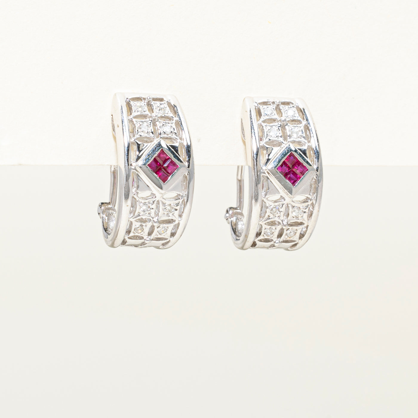 Illusion Set Diamond & Ruby Omega Earrings | 0.14ct, 0.50ctw