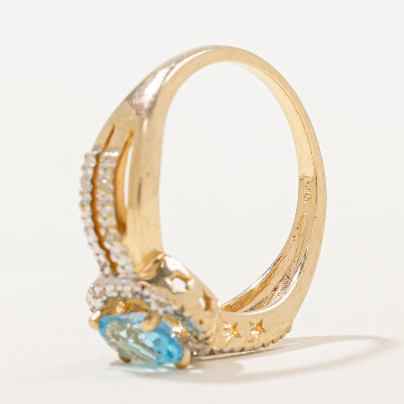 Oval Cut Blue Topaz & Diamond Halo Crossover Ring | 0.73ct, 0.06ctw | SZ 7.25 |