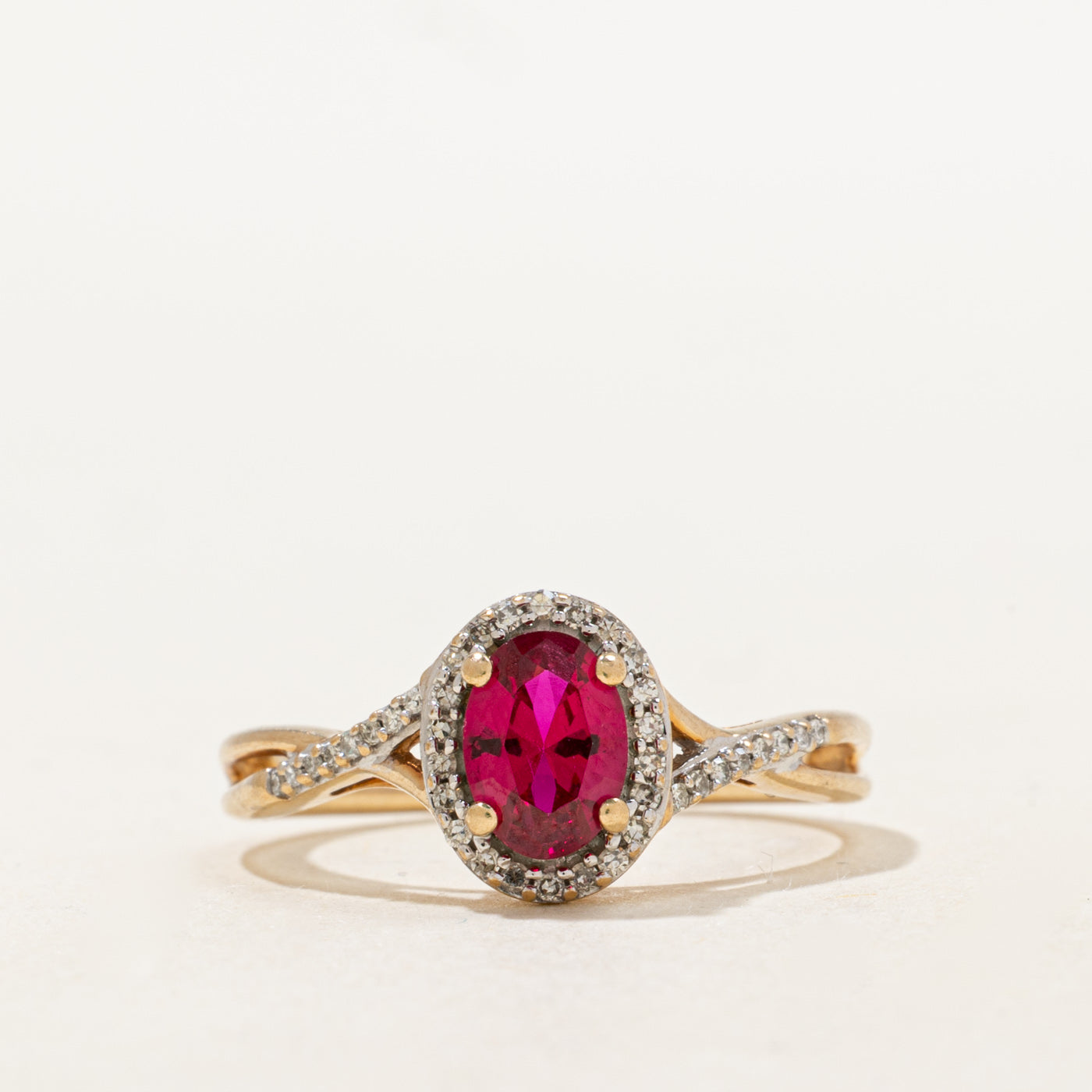 Synthetic Ruby & Natural Diamond Halo Crossover Ring | 0.84ct, 0.08ctw | SZ 6.75 |