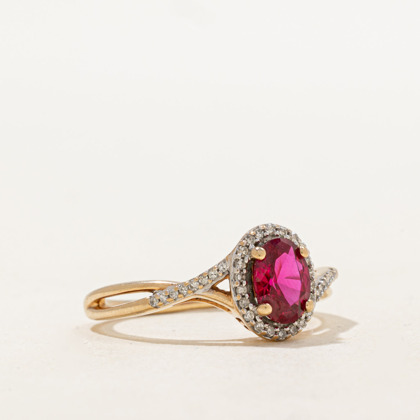 Synthetic Ruby & Natural Diamond Halo Crossover Ring | 0.84ct, 0.08ctw | SZ 6.75 |