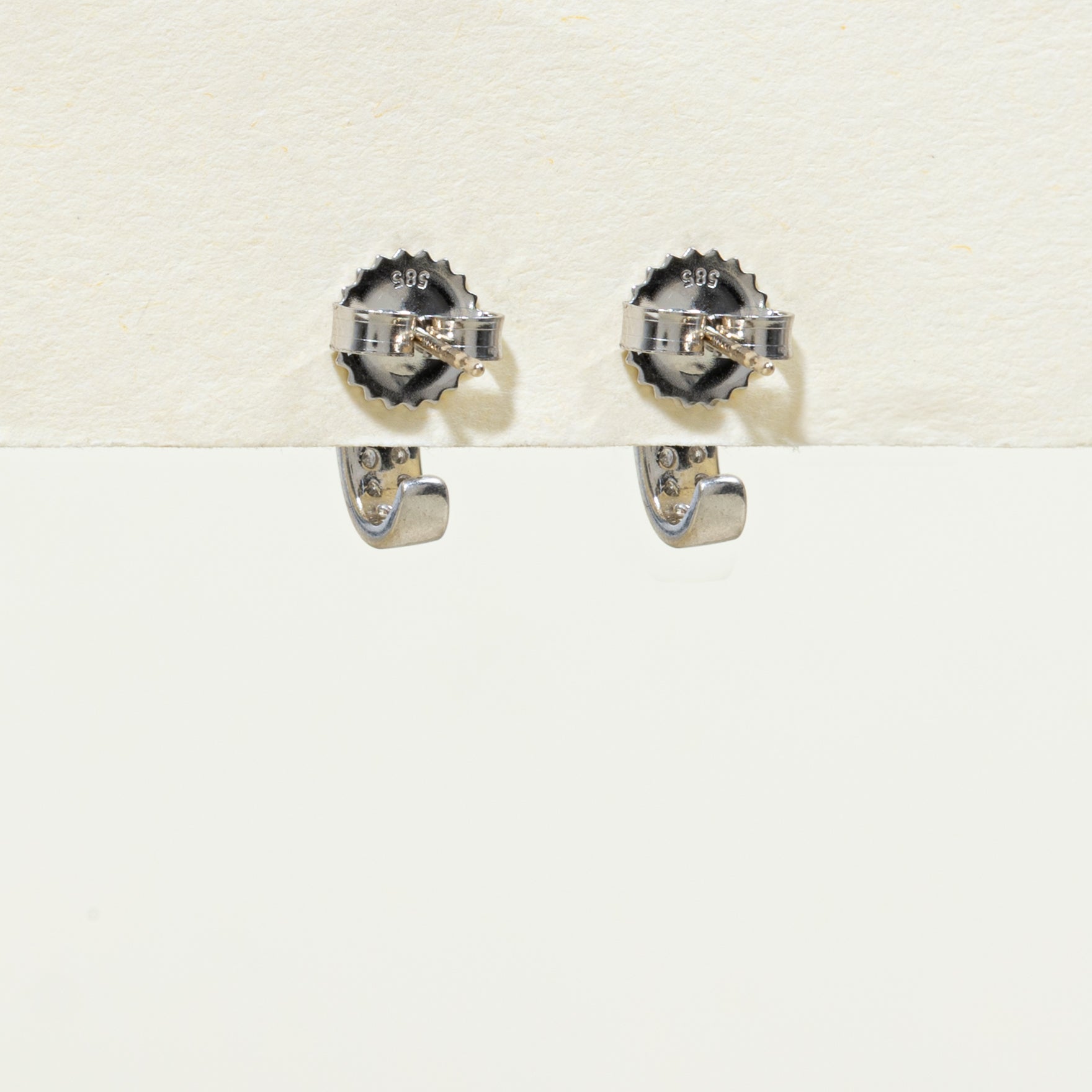 Boucles d'oreilles pendantes incurvées serties de saphirs et de diamants | 0,66 ct, 0,12 ct