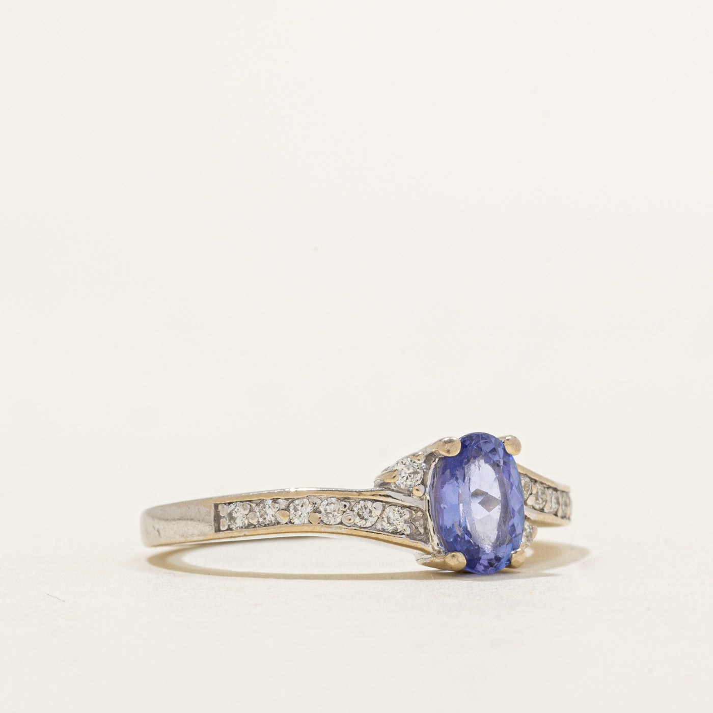 Oval Cut Tanzanite & Diamond Bypass Ring | 0.78ct, 0.14ctw | SZ 8.25