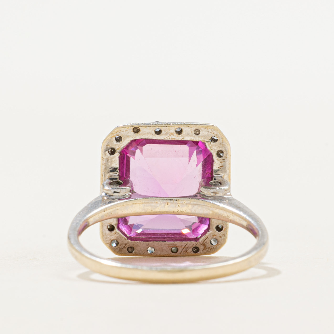Bezel Set Synthetic Pink Sapphire & Diamond Halo Ring | 6.70ct, 0.02ctw | SZ 6.75