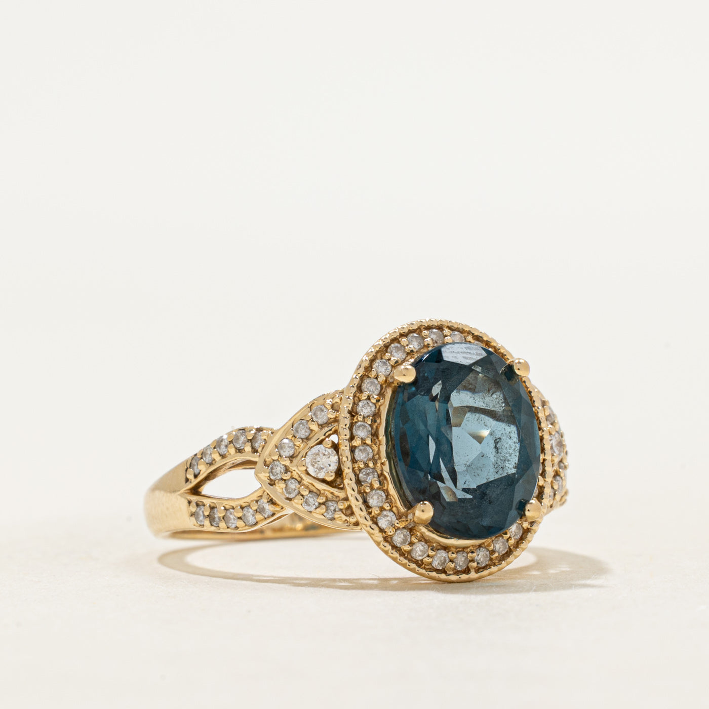 Oval Cut Blue Topaz & Diamond Halo Ring | 2.70ct, 0.16ctw | SZ 8