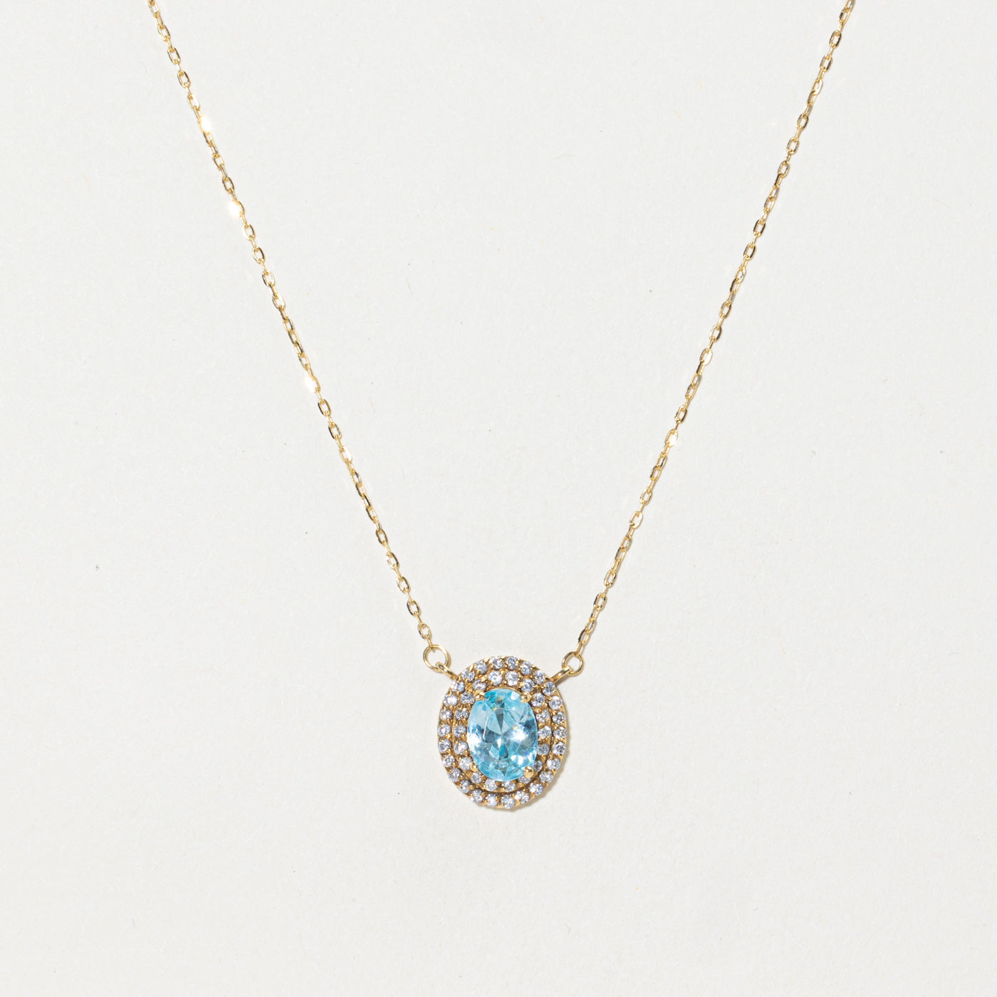 18k Oval Cut Blue Topaz & Diamond Halo Pendant Necklace | 1.12ct, 0.22ctw | 16"