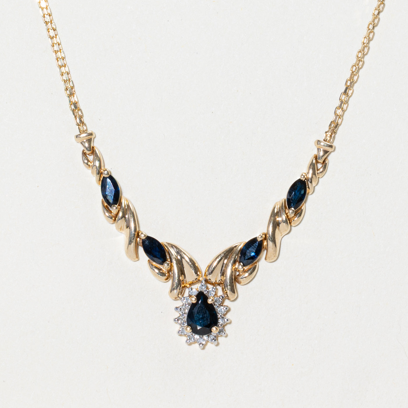 Pear Cut Sapphire & Diamond Halo Pendant Necklace | 1.42ctw, 0.07ctw | 15"