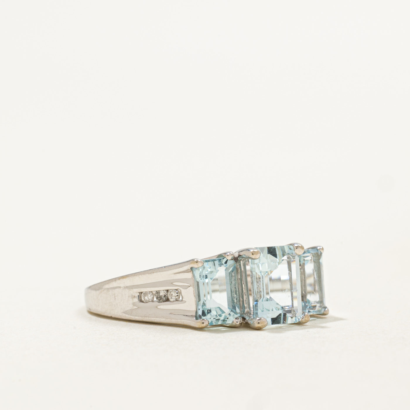 10K Three Stone Emerald Cut Aquamarine & Diamond Ring | 2.20ctw, 0.06ctw | SZ 6.75