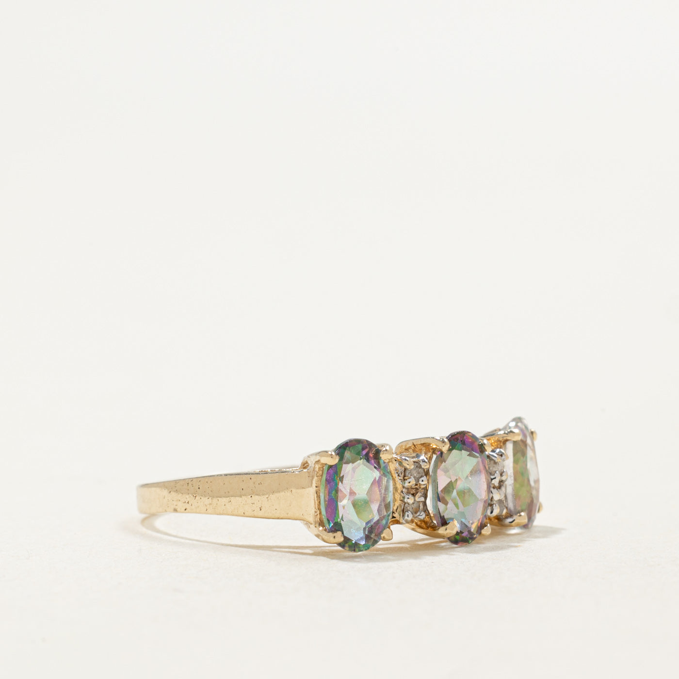 10K Three Stone Oval Cut Mystic Topaz & Diamond Ring | 1.50ctw, 0.03ctw | SZ 6.5
