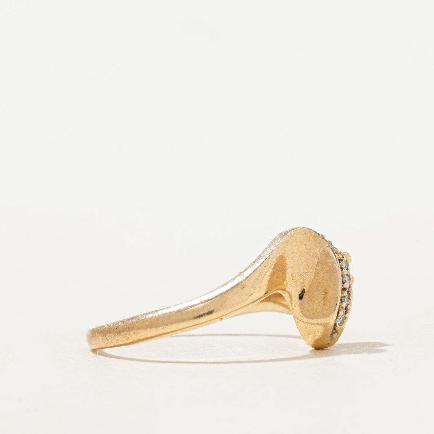 Bague contournée en émeraude taille poire et diamants | Taille 6,75