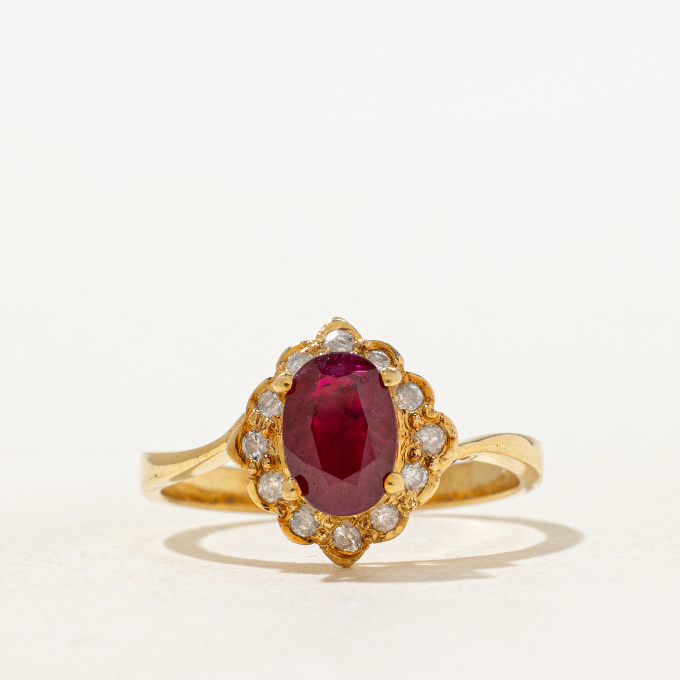 Oval Cut Ruby & Diamond Petal Halo Ring | 0.70ct, 0.06ctw | SZ 5.5