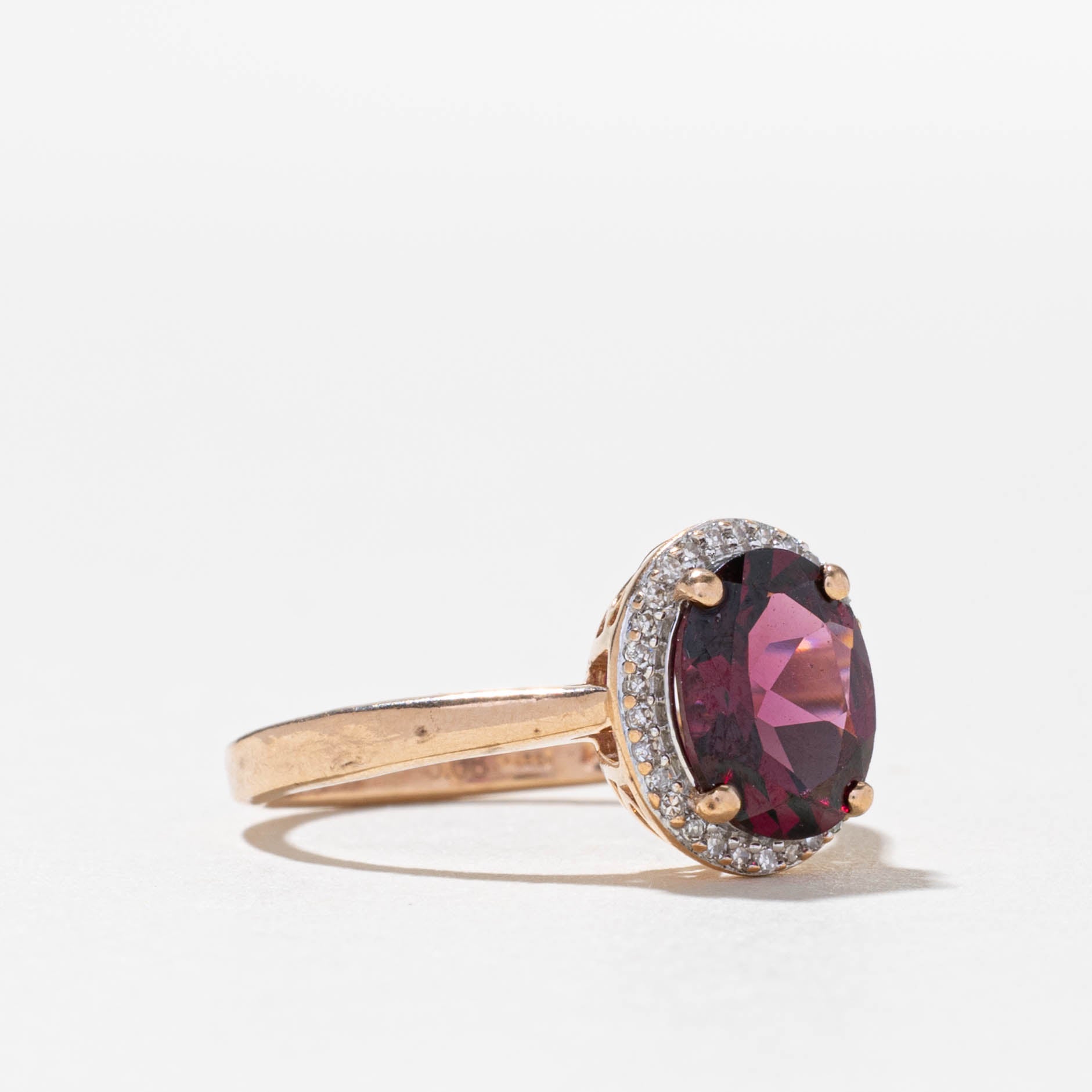 10k Oval Cut Garnet & Diamond Halo Ring | 1.90ct, 0.08ctw | SZ 6.5