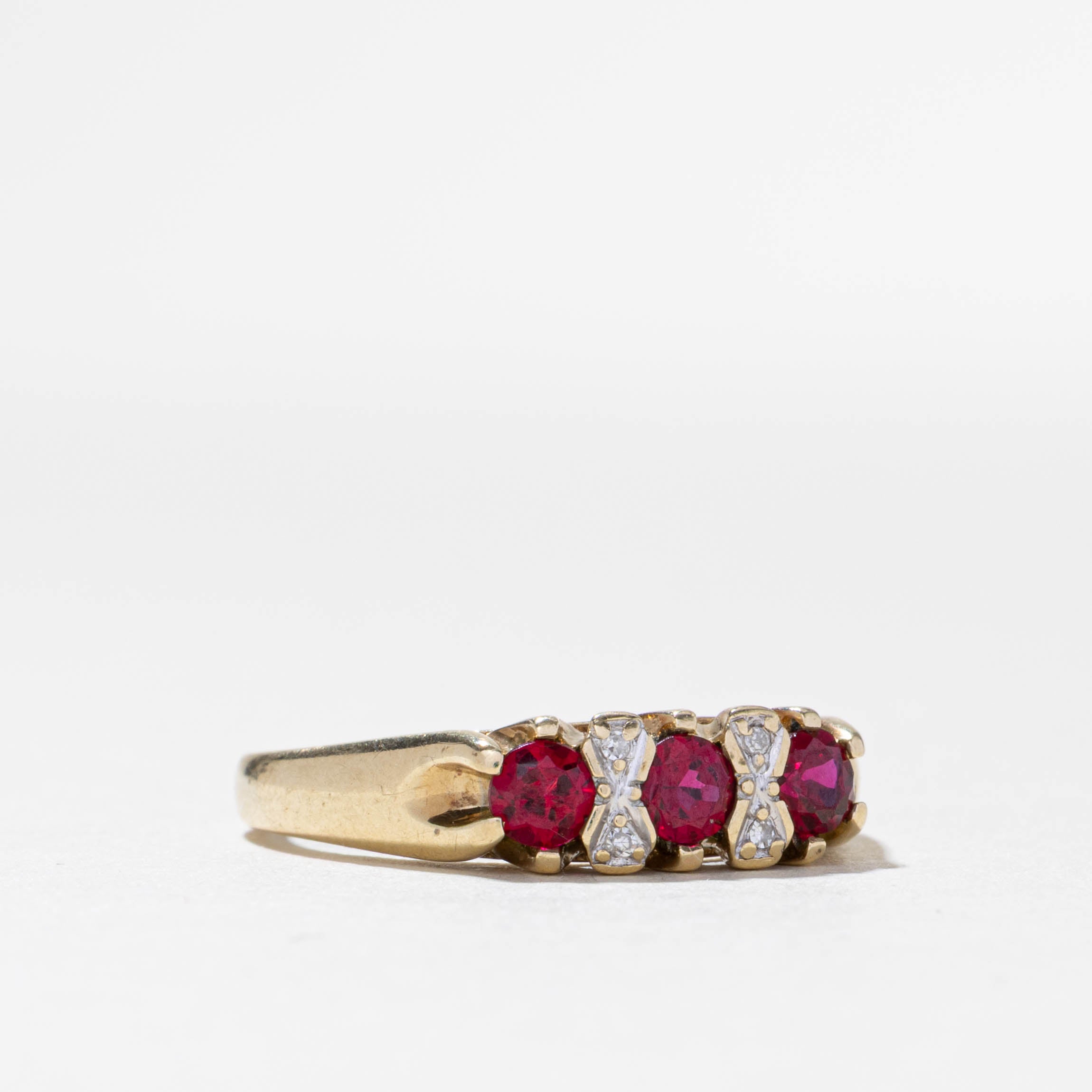 10k Three Stone Synthetic Ruby & Natural Diamond Ring | 0.50ctw, 0.02ctw | SZ 7.75