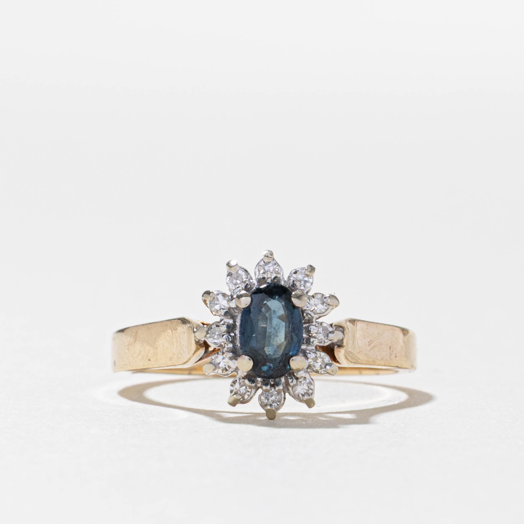 10k Oval Cut Sapphire & Diamond Petal Halo Ring | 0.31ct, 0.06ctw | SZ 7
