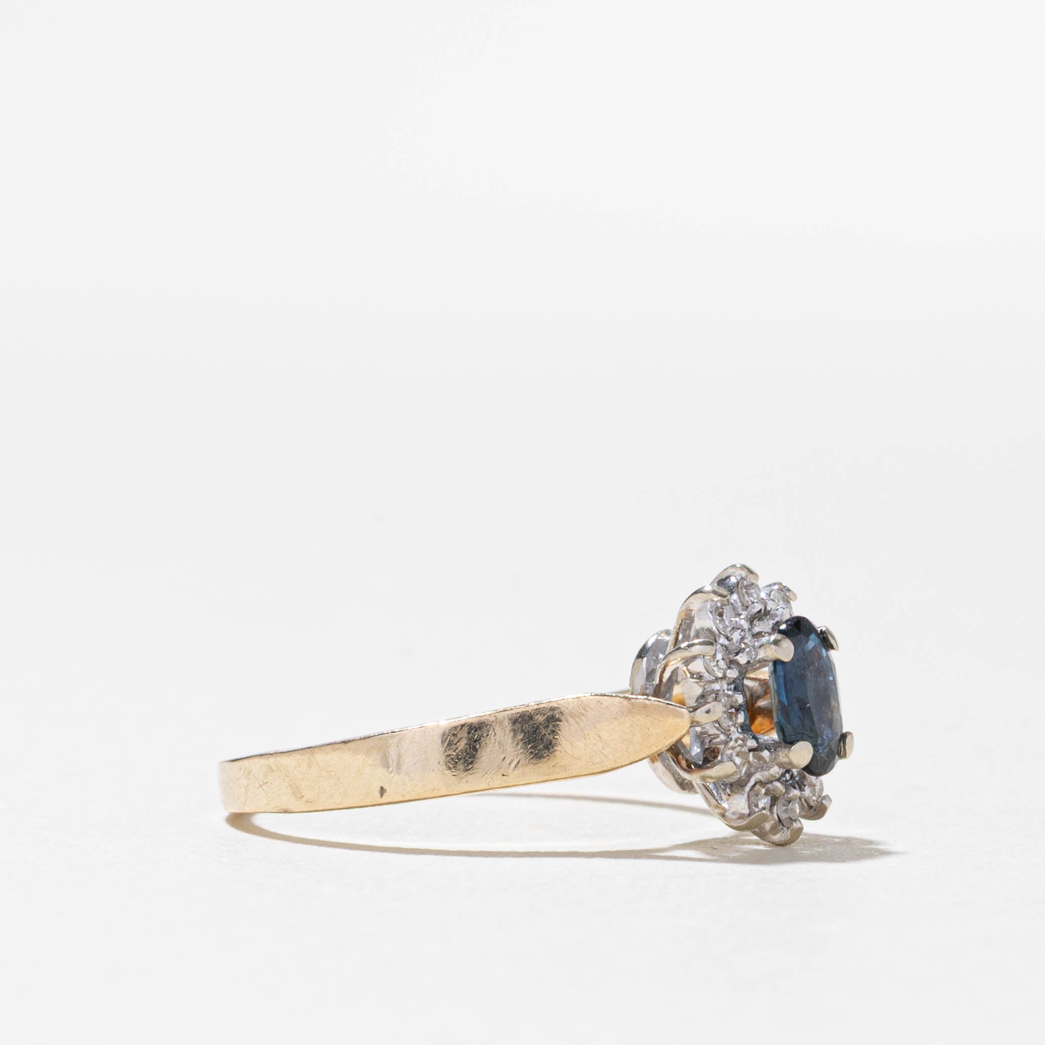 10k Oval Cut Sapphire & Diamond Petal Halo Ring | 0.31ct, 0.06ctw | SZ 7
