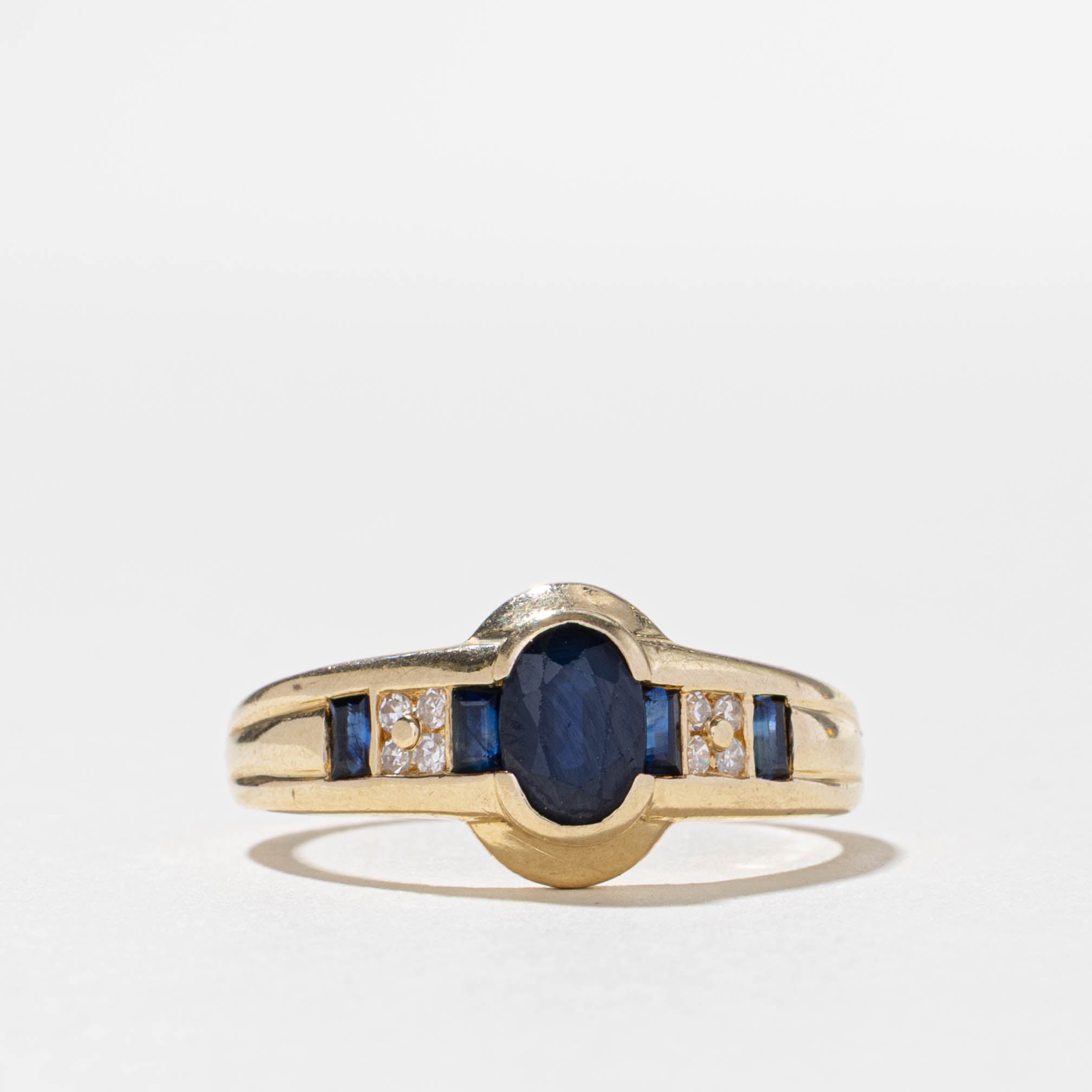 10k Semi Bezel Sapphire & Diamond Ring | 0.95ctw, 0.04ctw | SZ 9.5