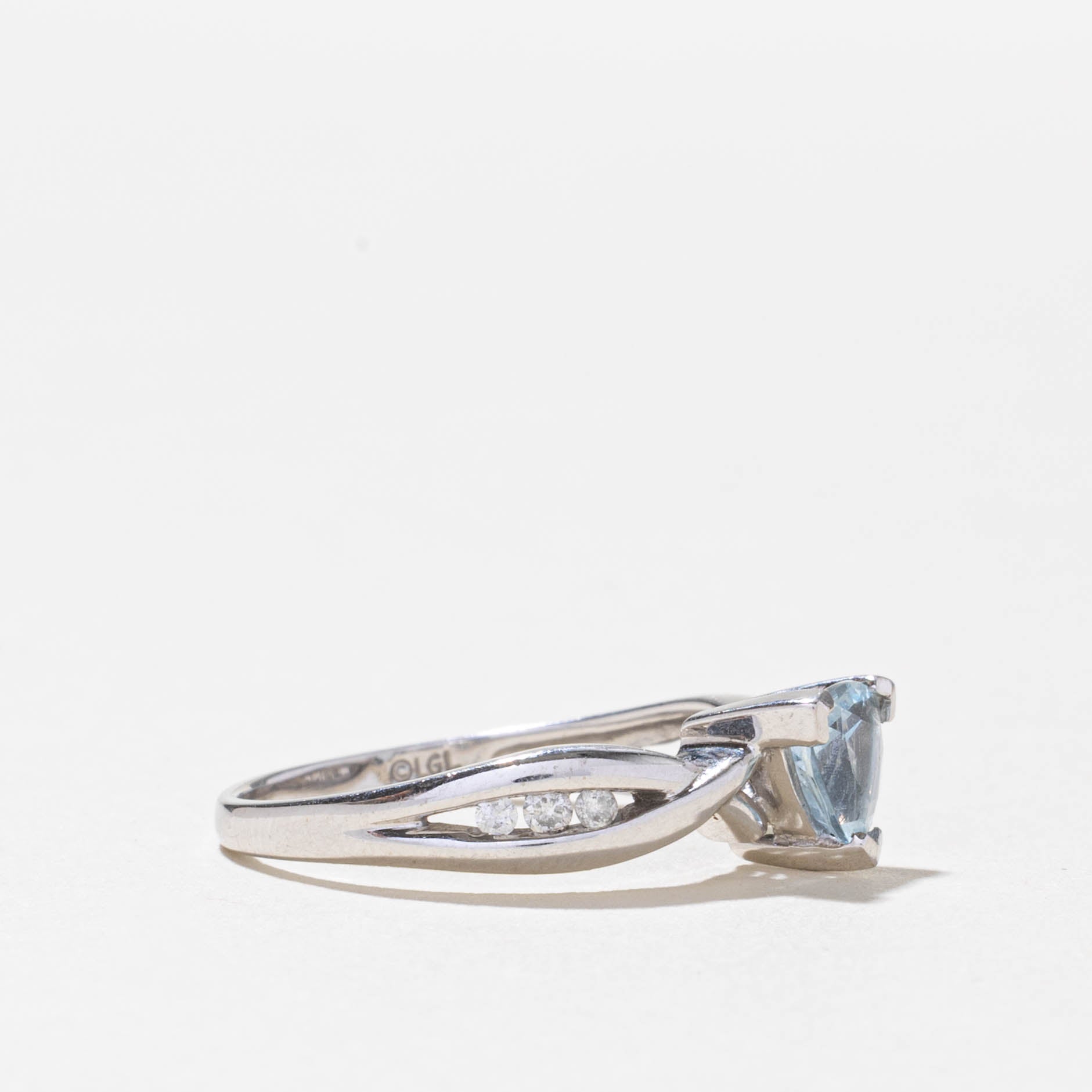 10k Aquamarine & Diamond Crossover Ring | 0.45ct, 0.03ctw | SZ 7.25
