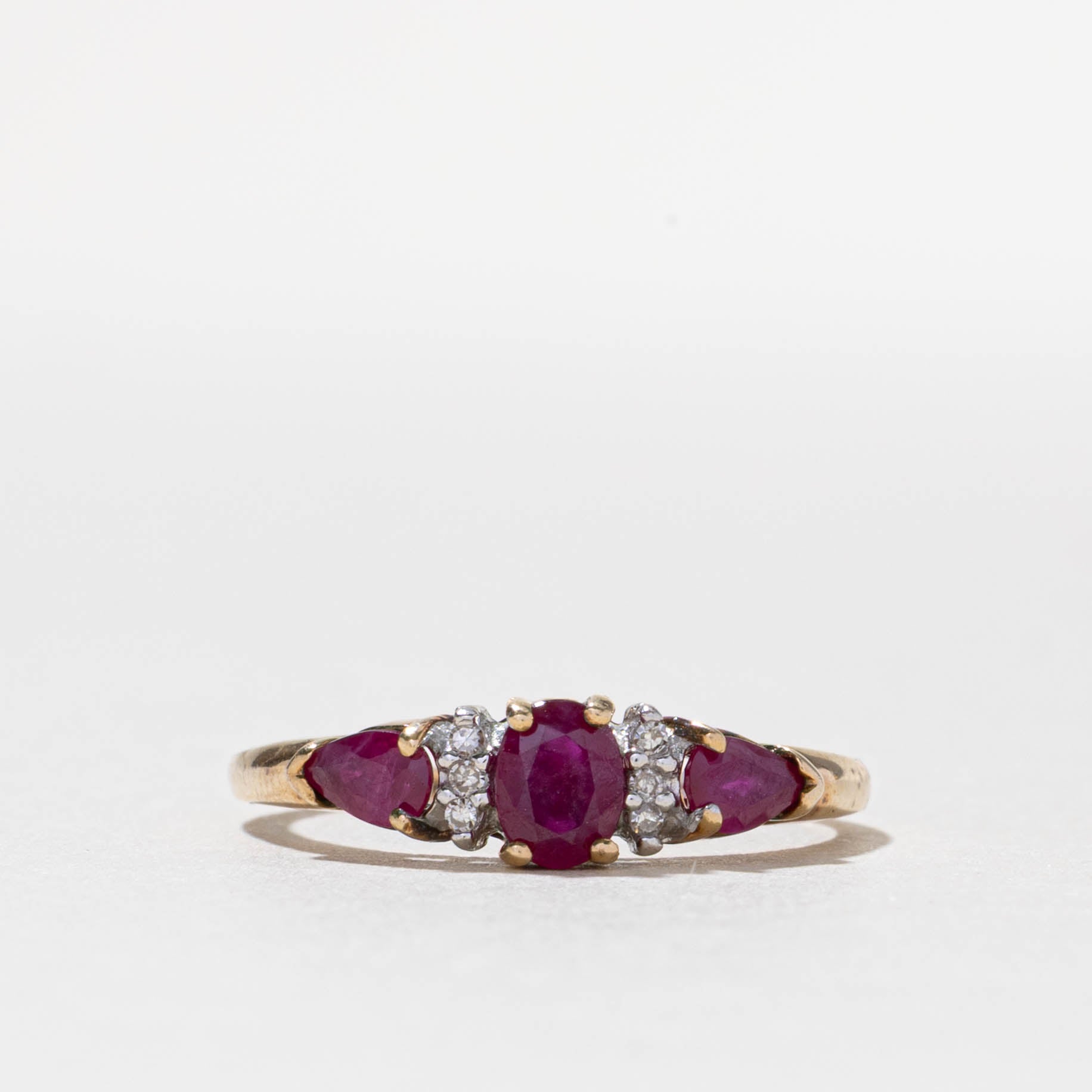 10k Three Stone Ruby & Diamond Accented Ring | 0.80ctw, 0.03ctw | SZ 8