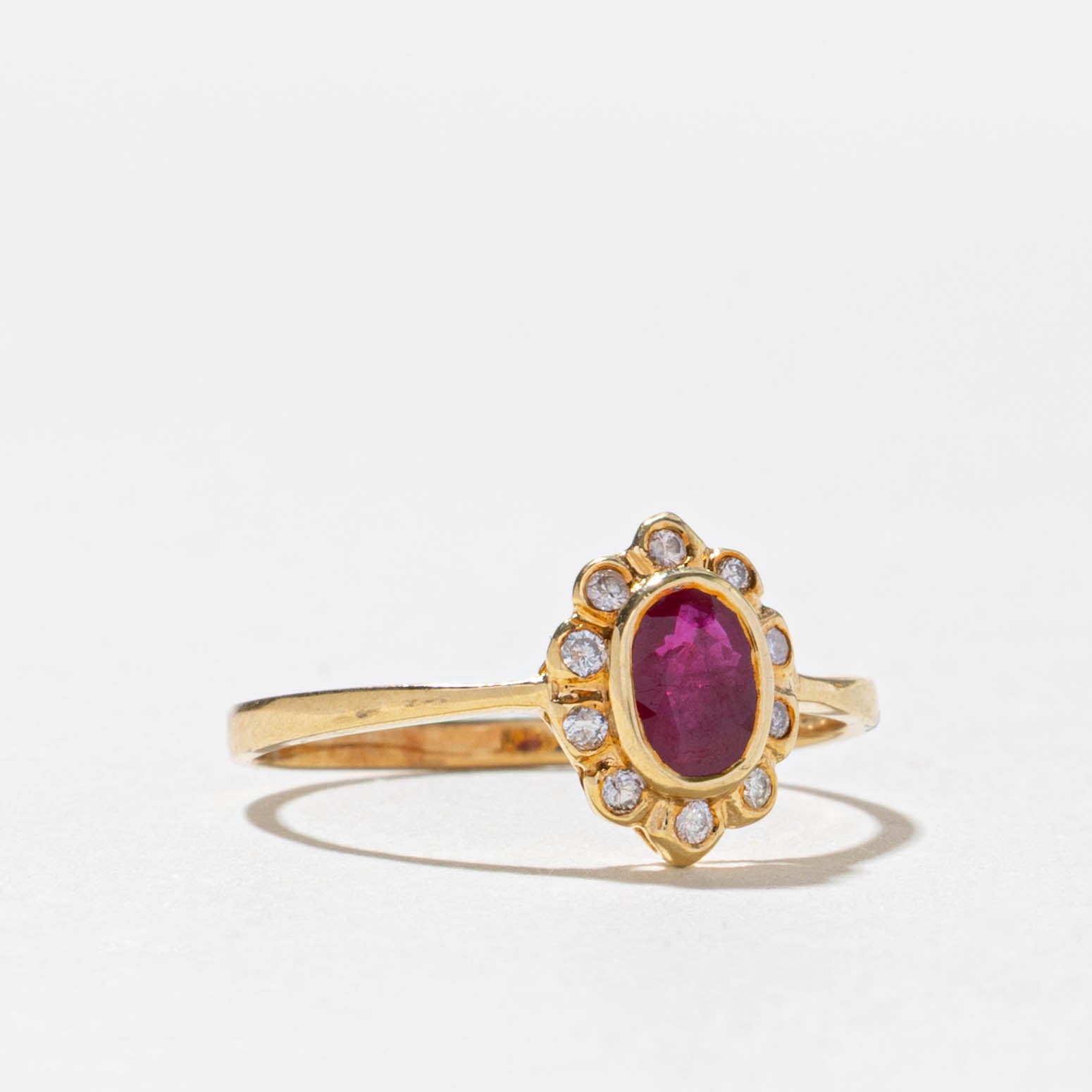 18k Oval Cut Ruby & Diamond Halo Ring | 0.33ct, 0.05ctw | SZ 6.75