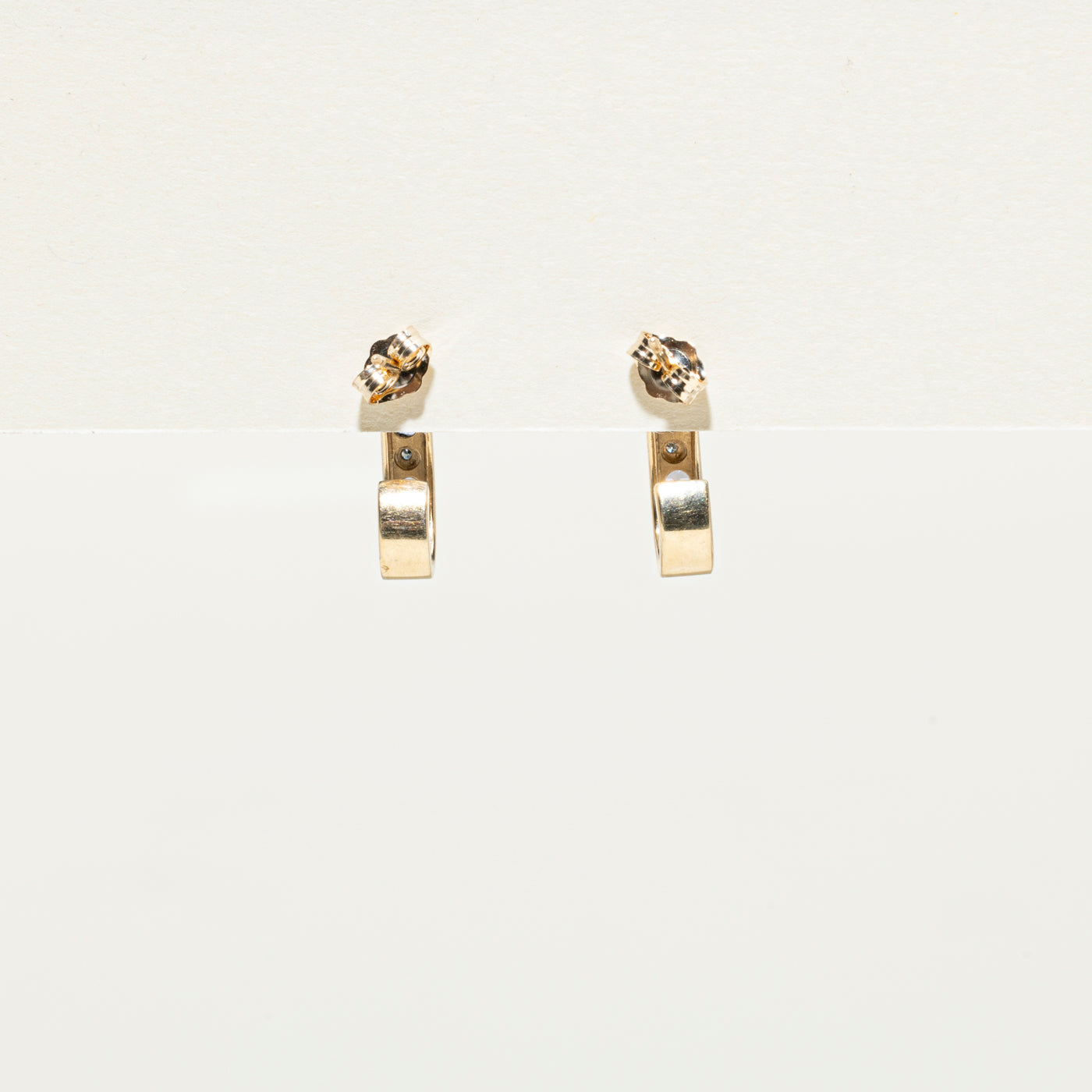 Boucles d'oreilles demi-huggie en tanzanite et diamants | 0,23 ct, 0,03 ct