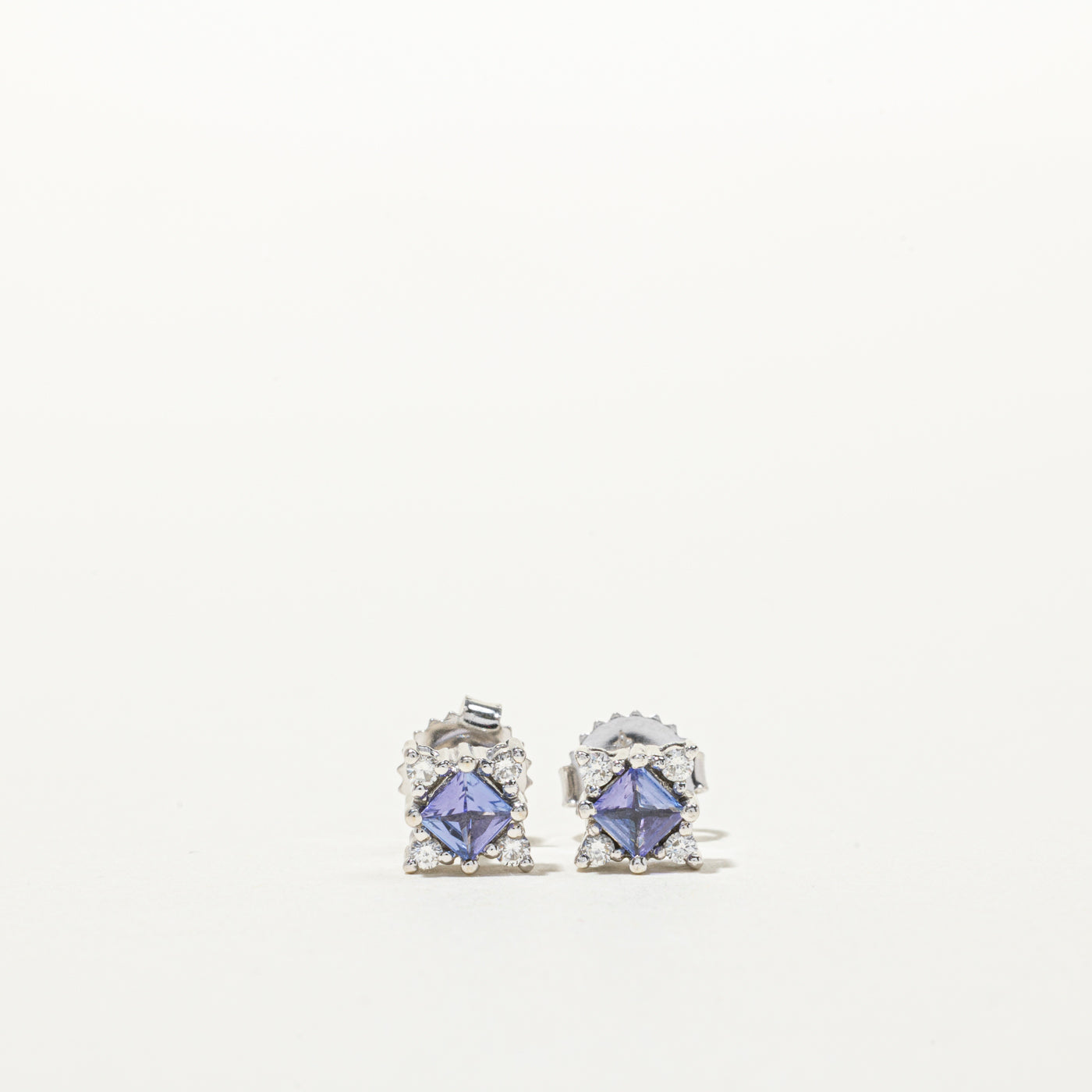 Boucles d'oreilles puces en tanzanite et diamants sertis halo | 0,44 ct, 0,05 ct